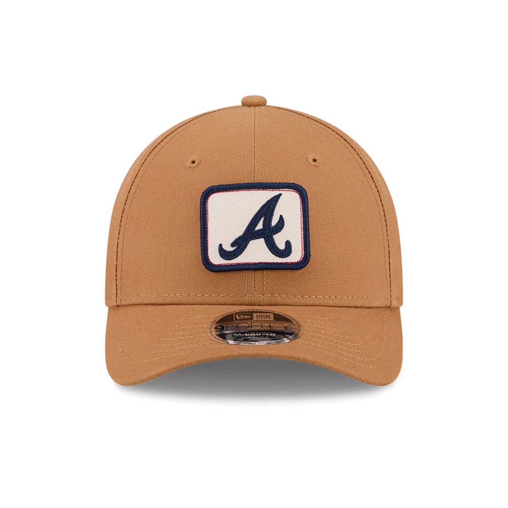 Pictured is this MLB Team Choice Atlanta Braves 9FORTY M-Crown cap in beige. 9
