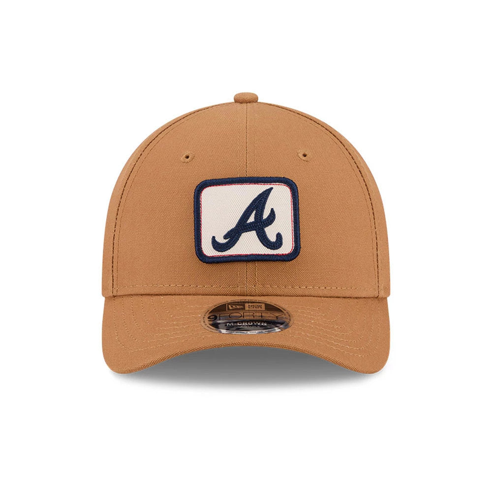 Pictured is this MLB Team Choice Atlanta Braves 9FORTY M-Crown cap in beige. 9
