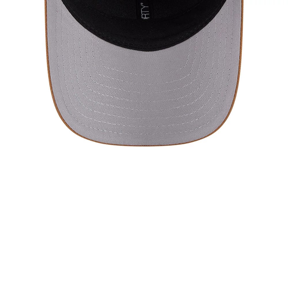 Atlanta Braves MLB Team Choice Beige New Era 9FORTY M-Crown Adjustable Cap, inside view showing the black sweatband, grey undervisor and part of a 9FORTY size sticker, with beige stitching along the edges.