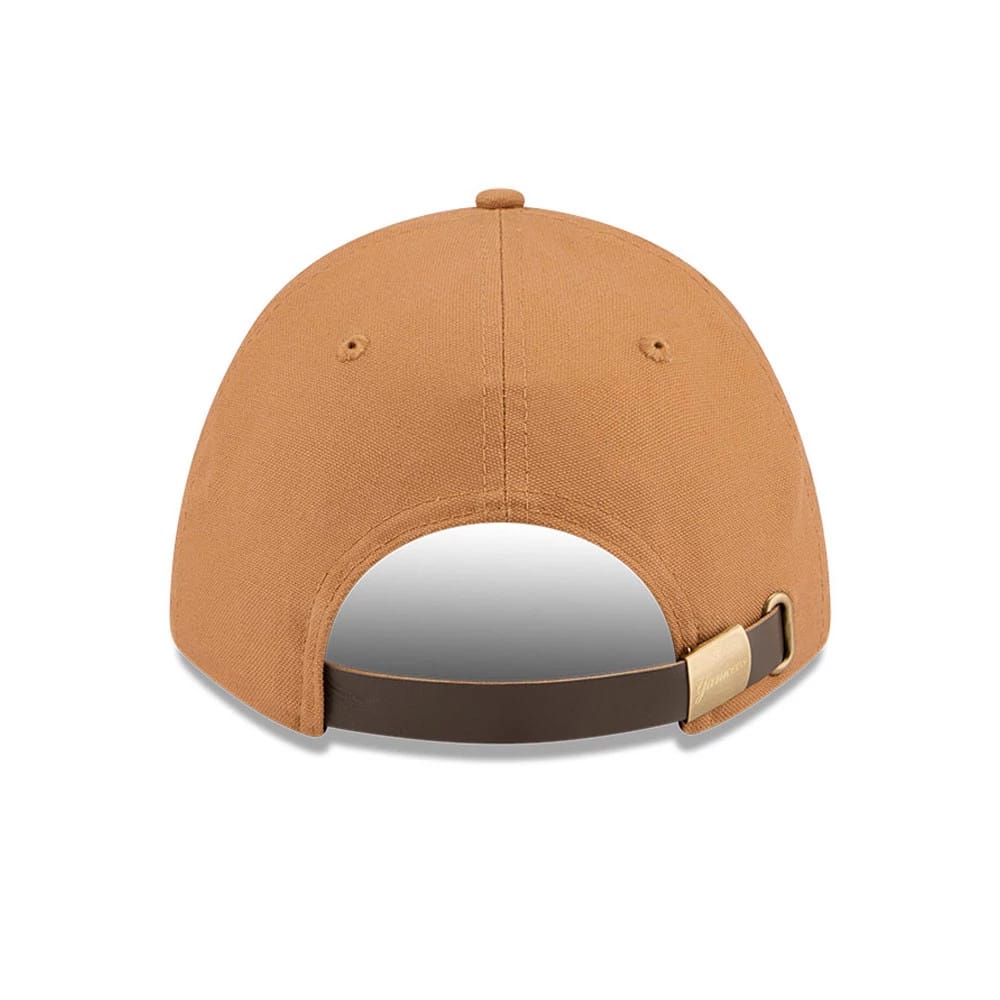 New York Yankees MLB Team Choice Beige New Era 9FORTY M-Crown Adjustable Cap, rear view showing the curved brown visor, beige structured crown, and an adjustable strap with a buckle for customised fit.