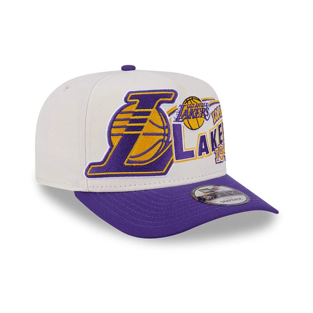 LA Lakers NBA Classic White New Era 9FIFTY A-Frame Snapback Adjustable Cap, three-quarter view showing the large embroidered purple and gold Lakers logo on the front panel, with a curved purple visor and a 9FIFTY size sticker.