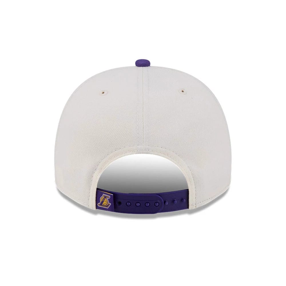 LA Lakers NBA Classic White New Era 9FIFTY A-Frame Snapback Adjustable Cap, rear view showing the purple snapback closure with a yellow and purple embroidered Lakers logo on the closure and a matching purple top button.