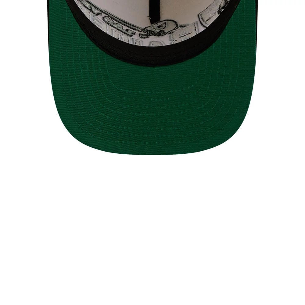 Las Vegas Raiders NFL Classic White New Era 9FIFTY A-Frame Snapback Adjustable Cap, inside view showing the green undervisor with printed black and white graphics beneath, and the dark sweatband lining the interior edge.