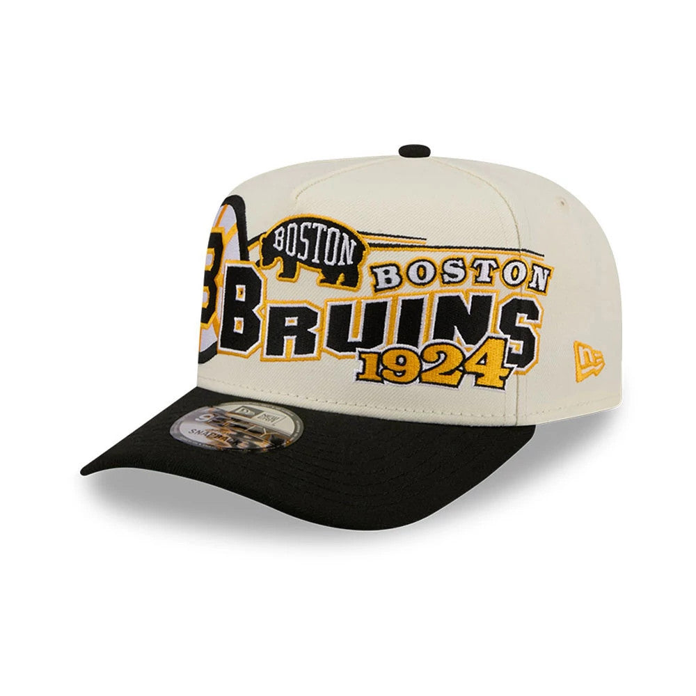 Boston Bruins NHL Classic White New Era 9FIFTY A-Frame Snapback Adjustable Cap, front view showing the raised embroidered black and yellow team logo design on the structured white crown, with a New Era flag logo on the left.