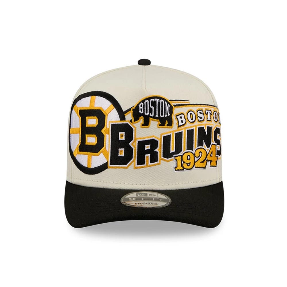 Boston Bruins NHL Classic White New Era 9FIFTY A-Frame Snapback Adjustable Cap, front view with large embroidered graphics showcasing the Bruins logo, a black contrast visor, and a 9FIFTY size sticker on the visor.
