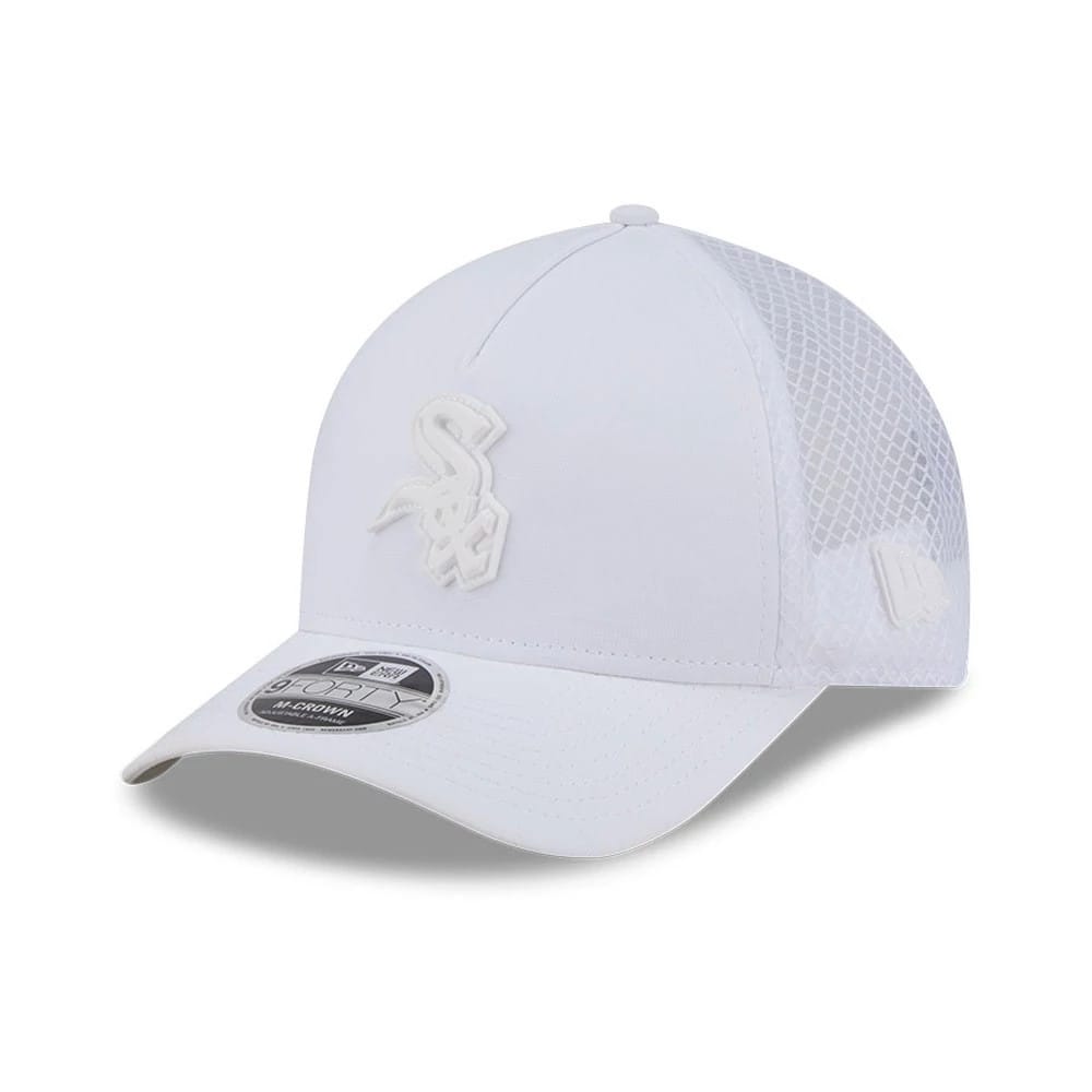 Chicago White Sox MLB Badged White New Era 9FORTY M-Crown A-Frame Trucker Cap, three-quarter view showing the white embroidered Sox logo on the front panel, curved white visor with the 9FORTY size sticker, and mesh back panels with New Era flag logo.