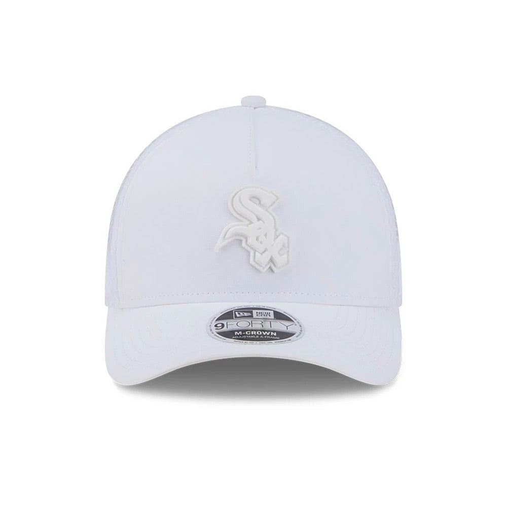 Chicago White Sox MLB Badged White New Era 9FORTY M-Crown A-Frame Trucker Cap, front view showing the raised white Sox logo embroidered on the structured white crown and a 9FORTY size sticker on the curved visor.