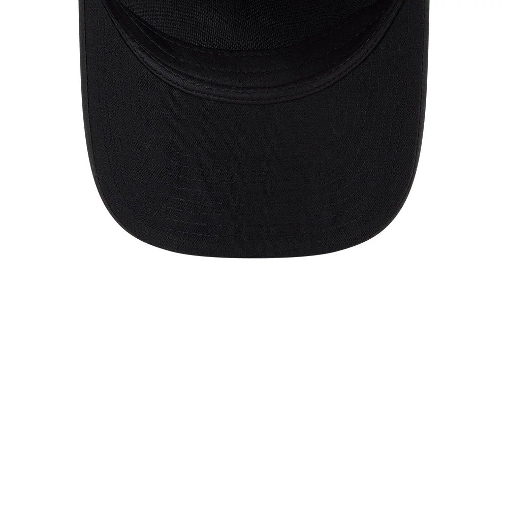 Chicago White Sox MLB Badged Black New Era 9FORTY M-Crown A-Frame Trucker Cap, close-up view showing the black curved visor with detailed stitching and a black top button on the structured crown.