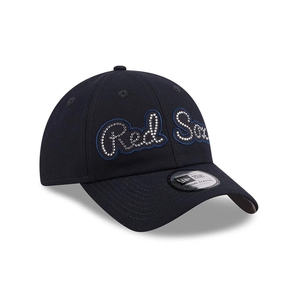 New Era Boston Red Sox MLB Rhinestone Navy Casual Classic Adjustable Cap, three-quarter view showing silver rhinestone Red Sox lettering on the front panel, New Era flag logo on the left side, and a curved navy visor with Casual Classic size sticker.