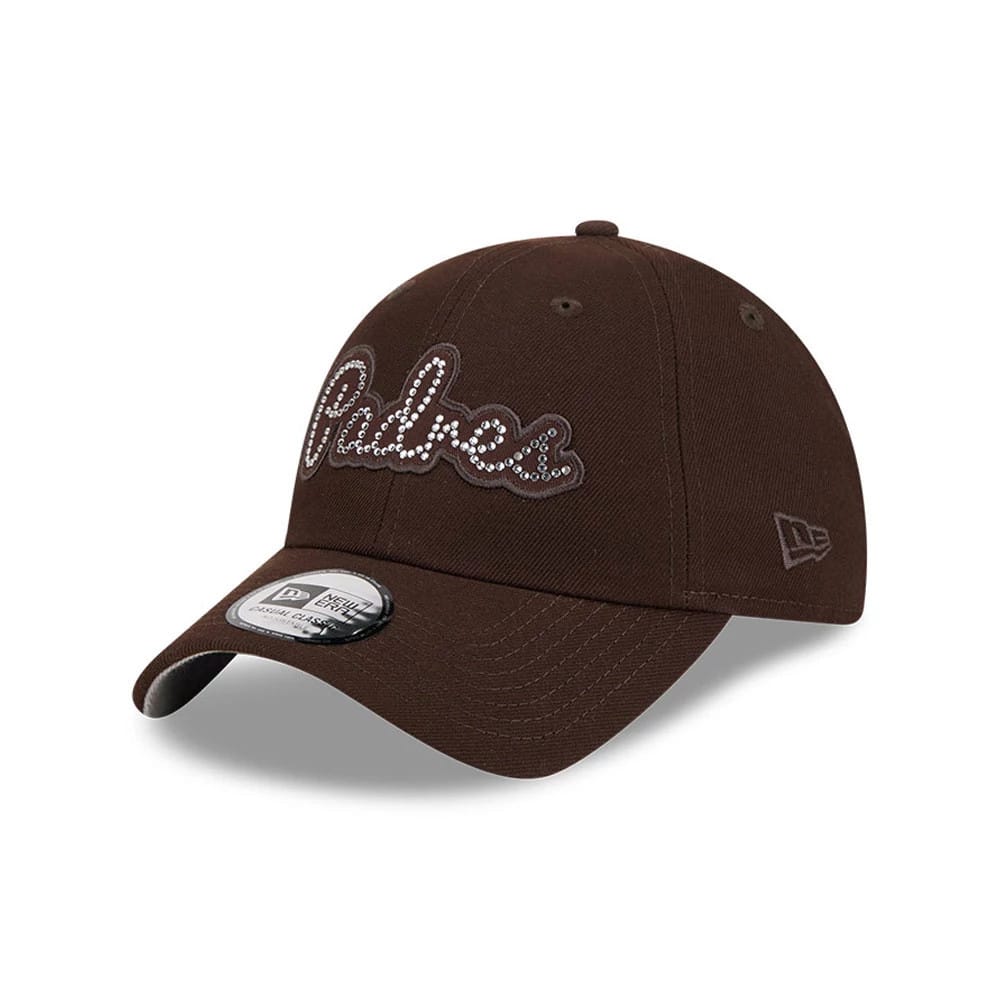 San Diego Padres MLB Rhinestone Dark Brown New Era Casual Classic Adjustable Cap, three-quarter view showing the rhinestone-embellished Padres script on the front panel, structured dark brown crown, and black 9FORTY size sticker on the curved visor.