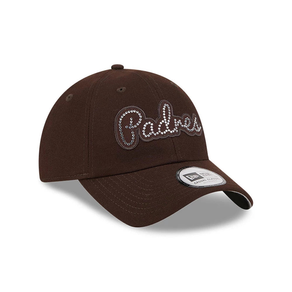 New Era San Diego Padres MLB Rhinestone Dark Brown Casual Classic Adjustable Cap, three-quarter view showing the Padres script logo in rhinestones on the front panel, complemented by a curved dark brown visor and an adjustable strap at the back.