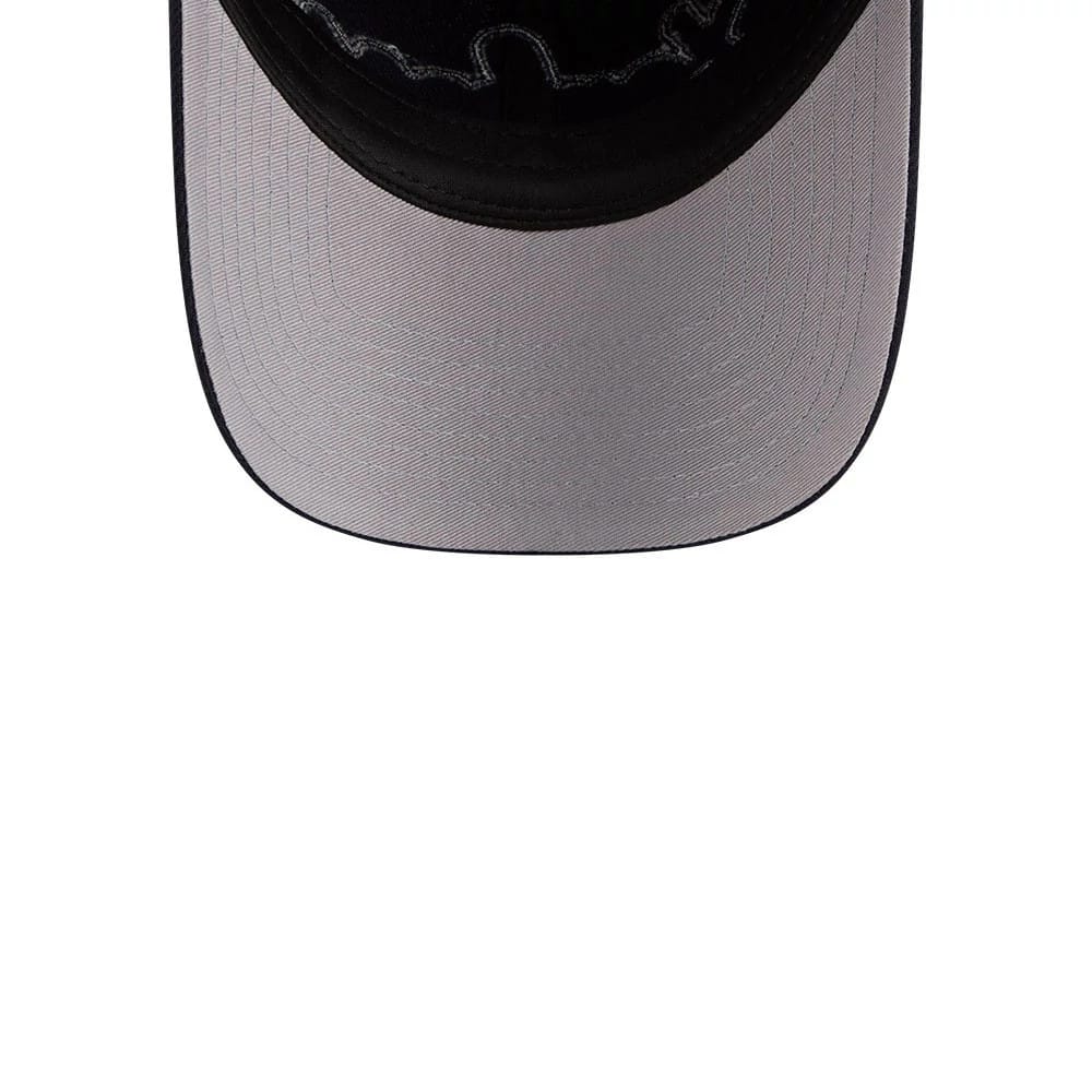 New York Yankees MLB Rhinestone Navy New Era Casual Classic Adjustable Cap, inside view showing the grey undervisor, black interior sweatband, and dark stitching on the inside of the structured crown.