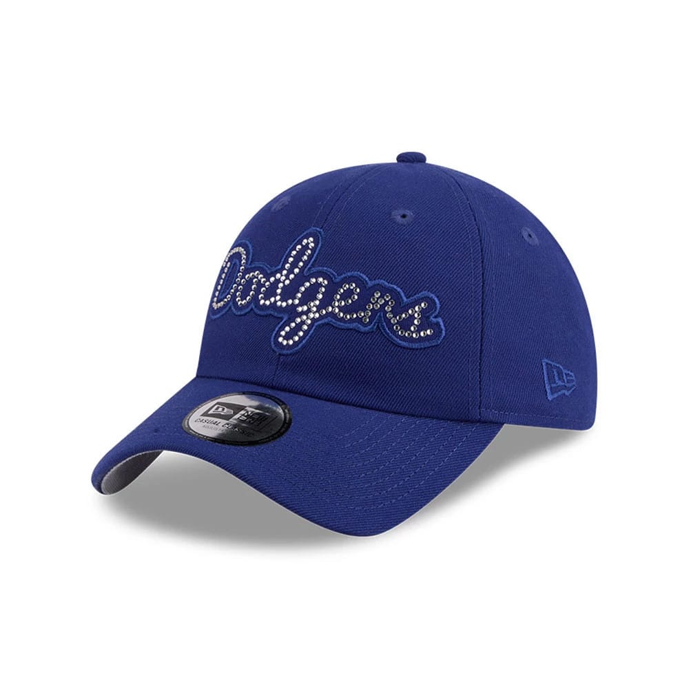 LA Dodgers MLB Rhinestone Dark Blue New Era Casual Classic Adjustable Cap, three-quarter view showing the sparkling rhinestone Dodgers script on the structured crown, a black New Era logo on the left side.