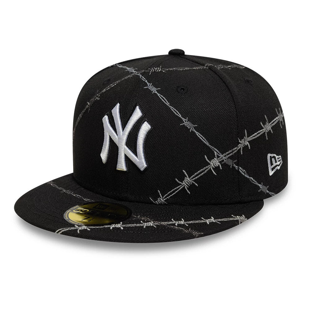New York Yankees MLB Wire Black New Era 59FIFTY Fitted Cap, three-quarter view showing the white embroidered NY logo on the front panel, barbed wire graphic on the structured black crown and visor, and gold 59FIFTY size sticker on the visor.
