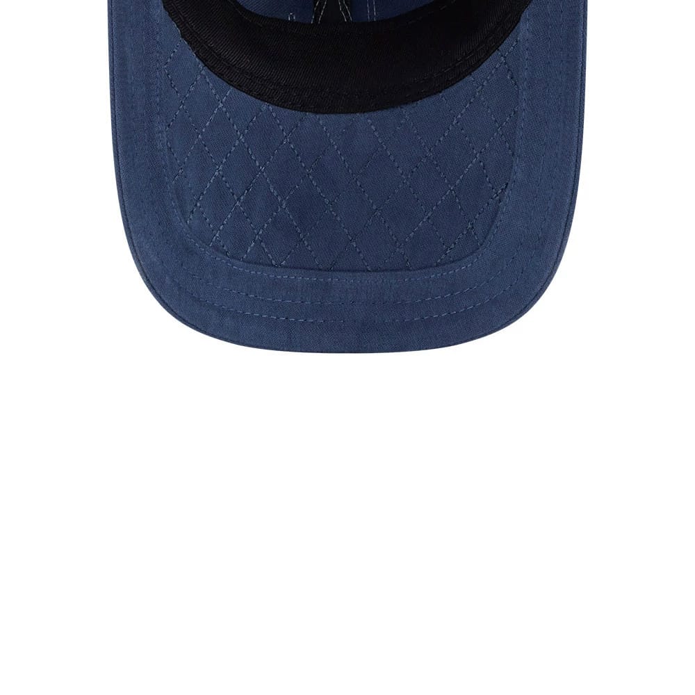 LA Dodgers MLB Quilted Dark Blue New Era 9TWENTY Adjustable Cap, inside view showing the quilted pattern on the dark blue undervisor and the black sweatband, highlighting the detailed inner craftsmanship.