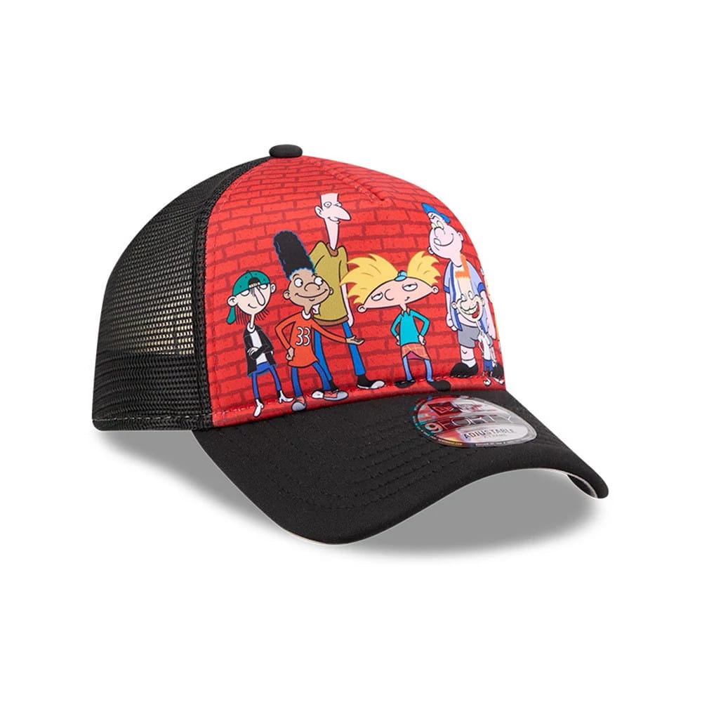 Hey Arnold Graphic Black New Era 9FORTY A-Frame Trucker Adjustable Cap, three-quarter view showing cartoon characters on the red front panel, black mesh sides, black curved visor, and 9FORTY size sticker on the top.