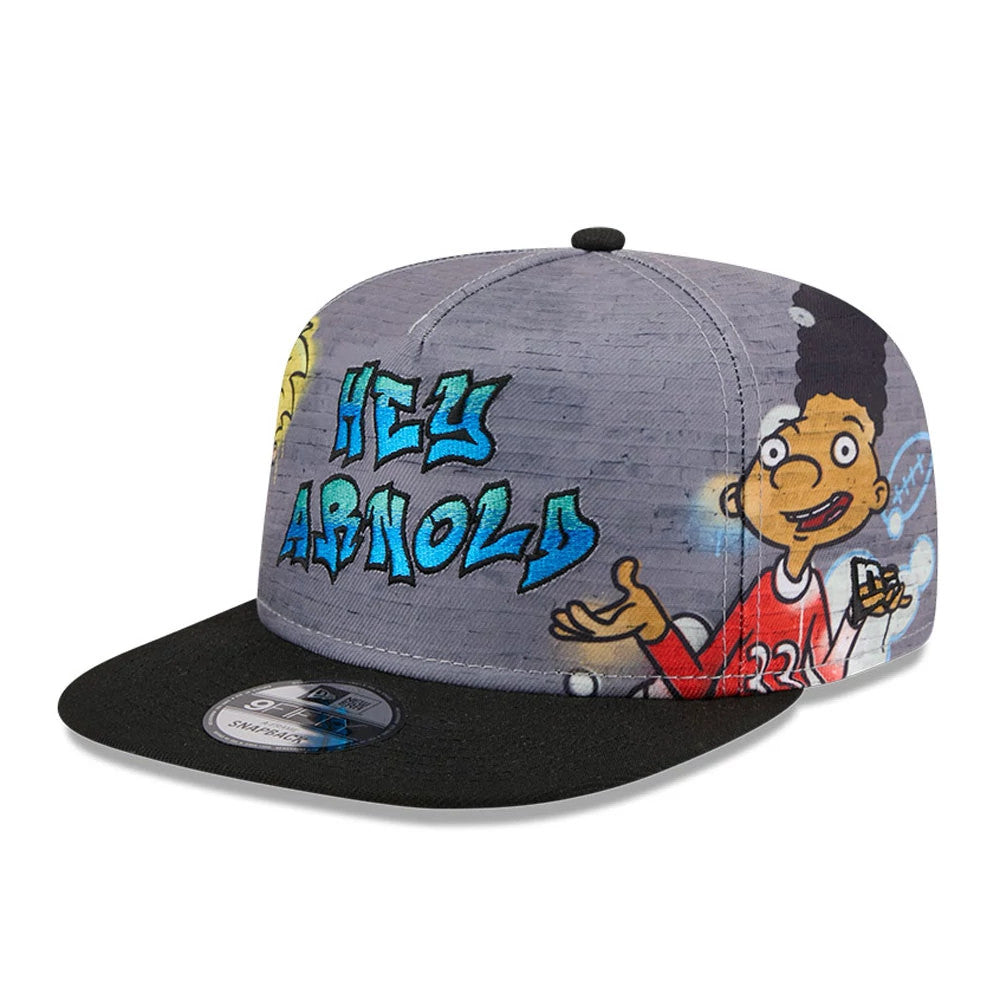 Hey Arnold Graffiti Grey New Era 9FIFTY A-Frame Snapback Adjustable Cap, front view showing blue graffiti-style Hey Arnold text and cartoon graphics on the grey structured crown with a black flat visor and a 9FIFTY size sticker.