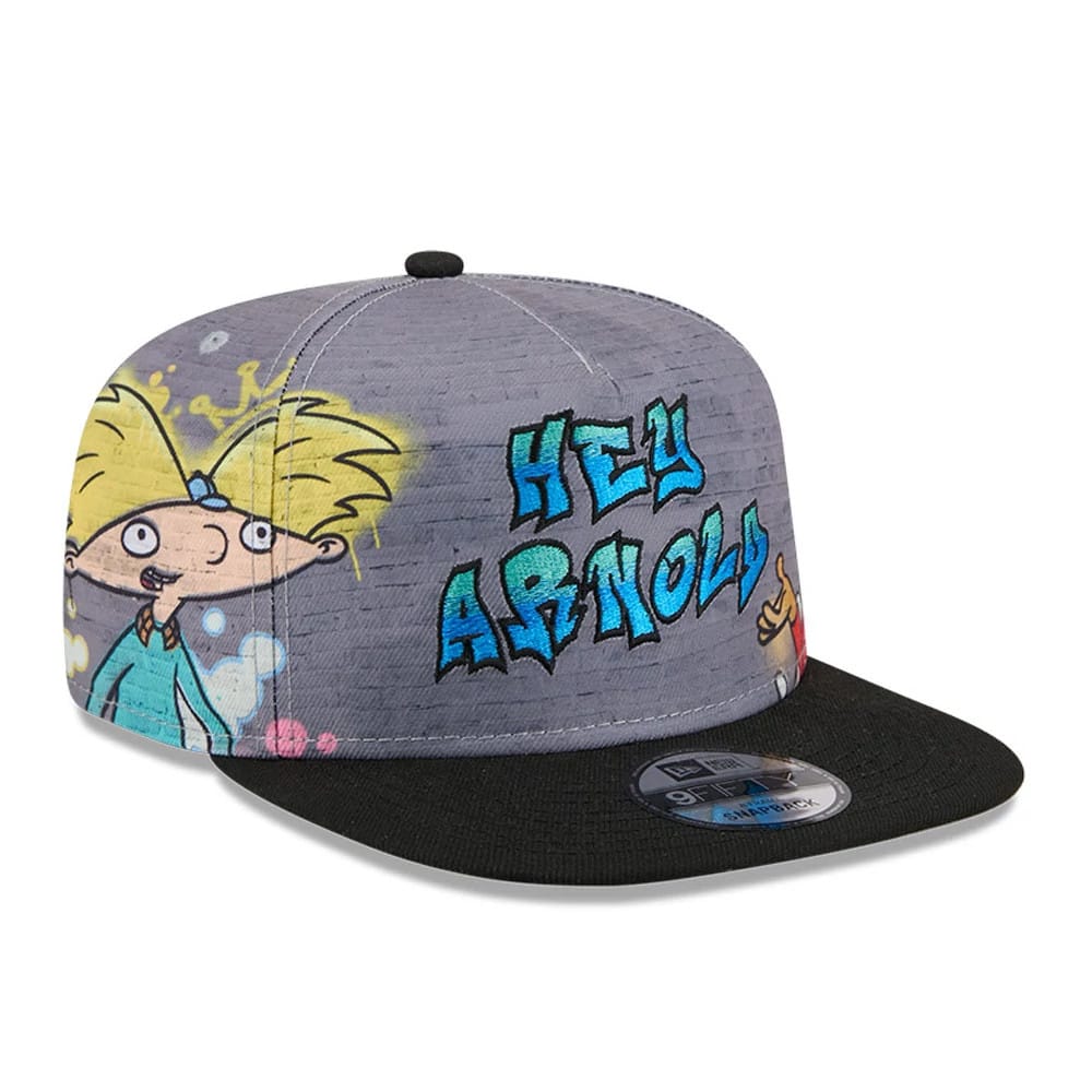Hey Arnold Graffiti Grey New Era 9FIFTY A-Frame Snapback Adjustable Cap, front view showing the colourful Hey Arnold graffiti design on the grey crown, with a black flat visor and a 9FIFTY size sticker.