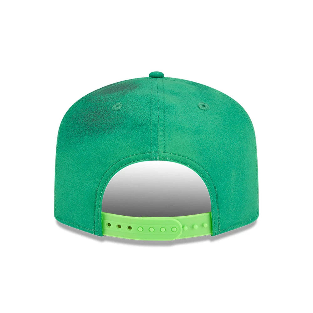 Power Puff Girls Buttercup Bright Green New Era 19TWENTY Adjustable Cap, rear view showing a bright green snapback closure with matching stitching, centred on the soft bright green crown with eyelets and a top button.