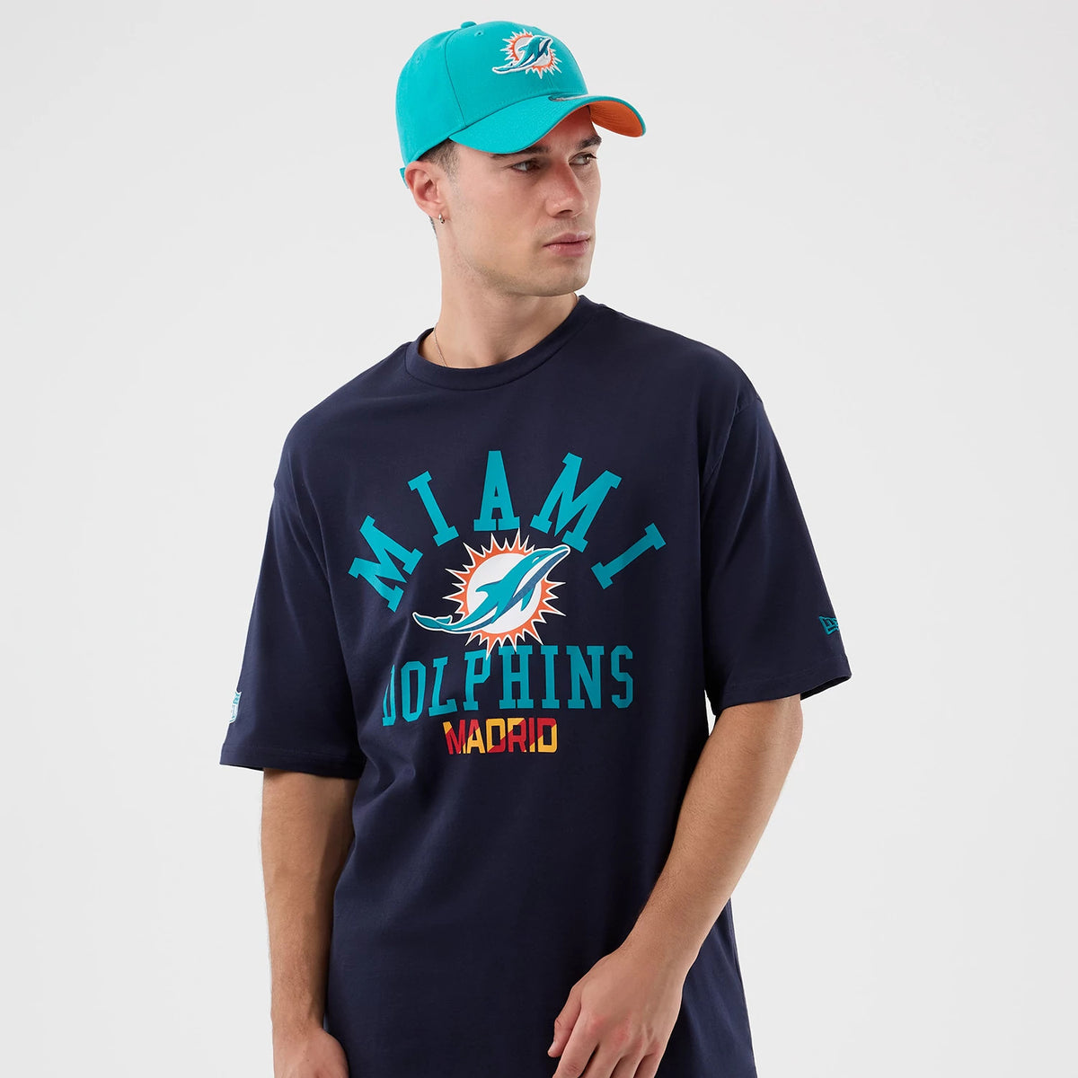 The Male model is wearing Miami Dolphins NFL International Series Games Navy Oversized T-Shirt 7
