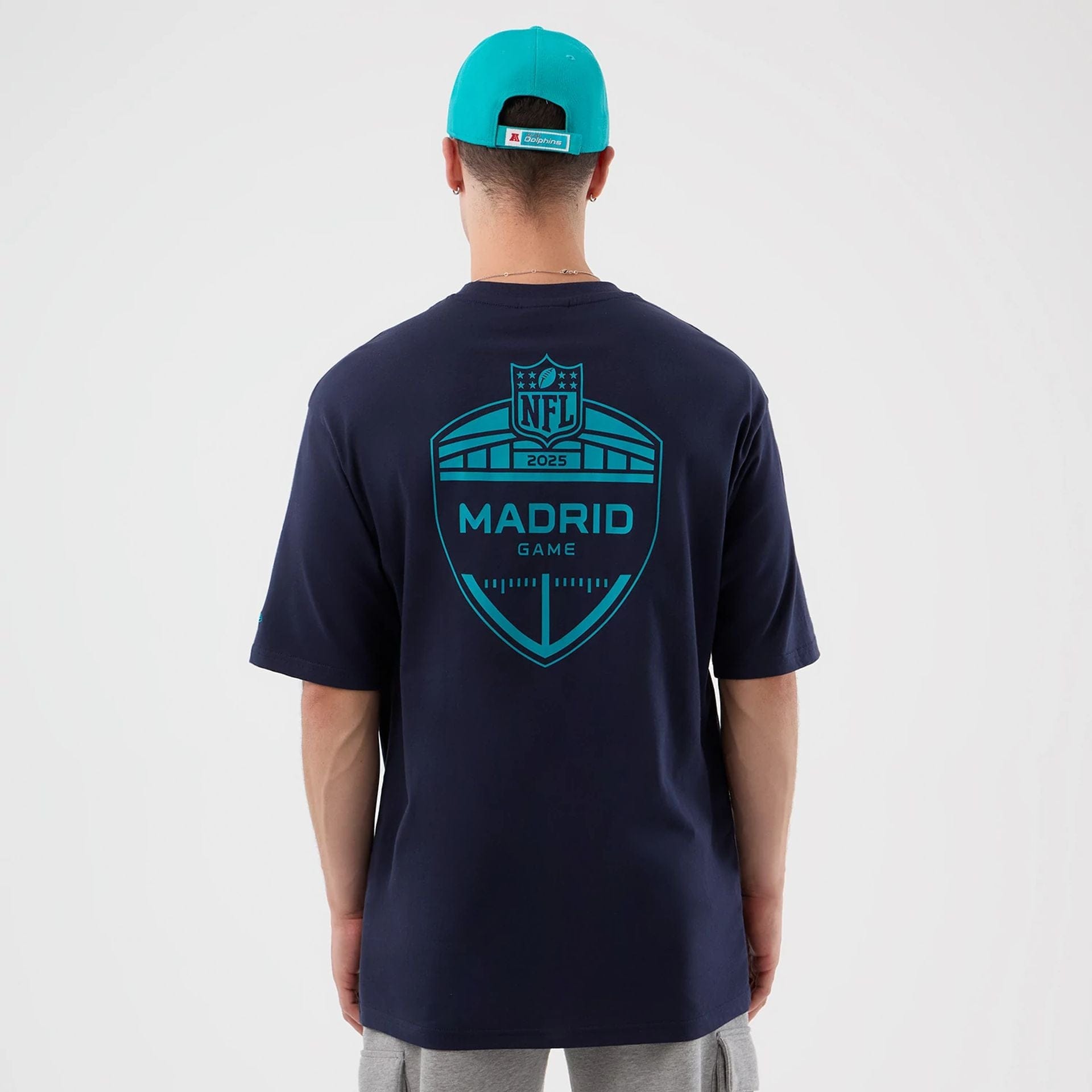 The Male model is wearing Miami Dolphins NFL International Series Games Navy Oversized T-Shirt 2