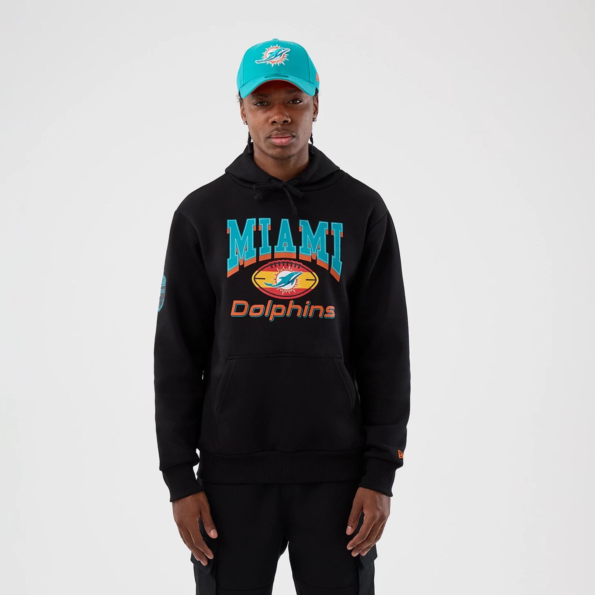 The Male model is wearing Miami Dolphins NFL International Series Games Black Pullover Hoodie 1