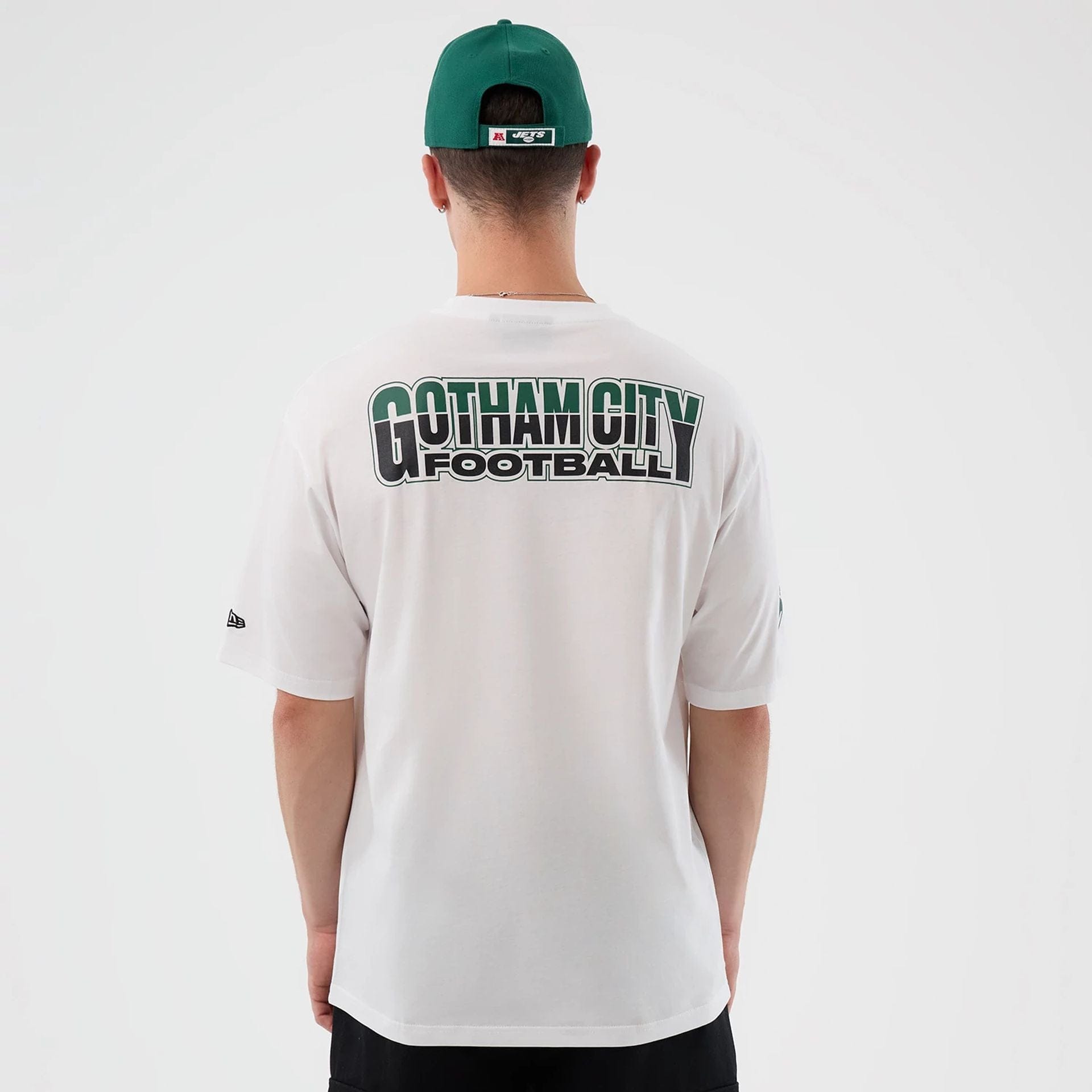 The Male model is wearing New York Jets NFL International Series Games White Oversized T-Shirt 2