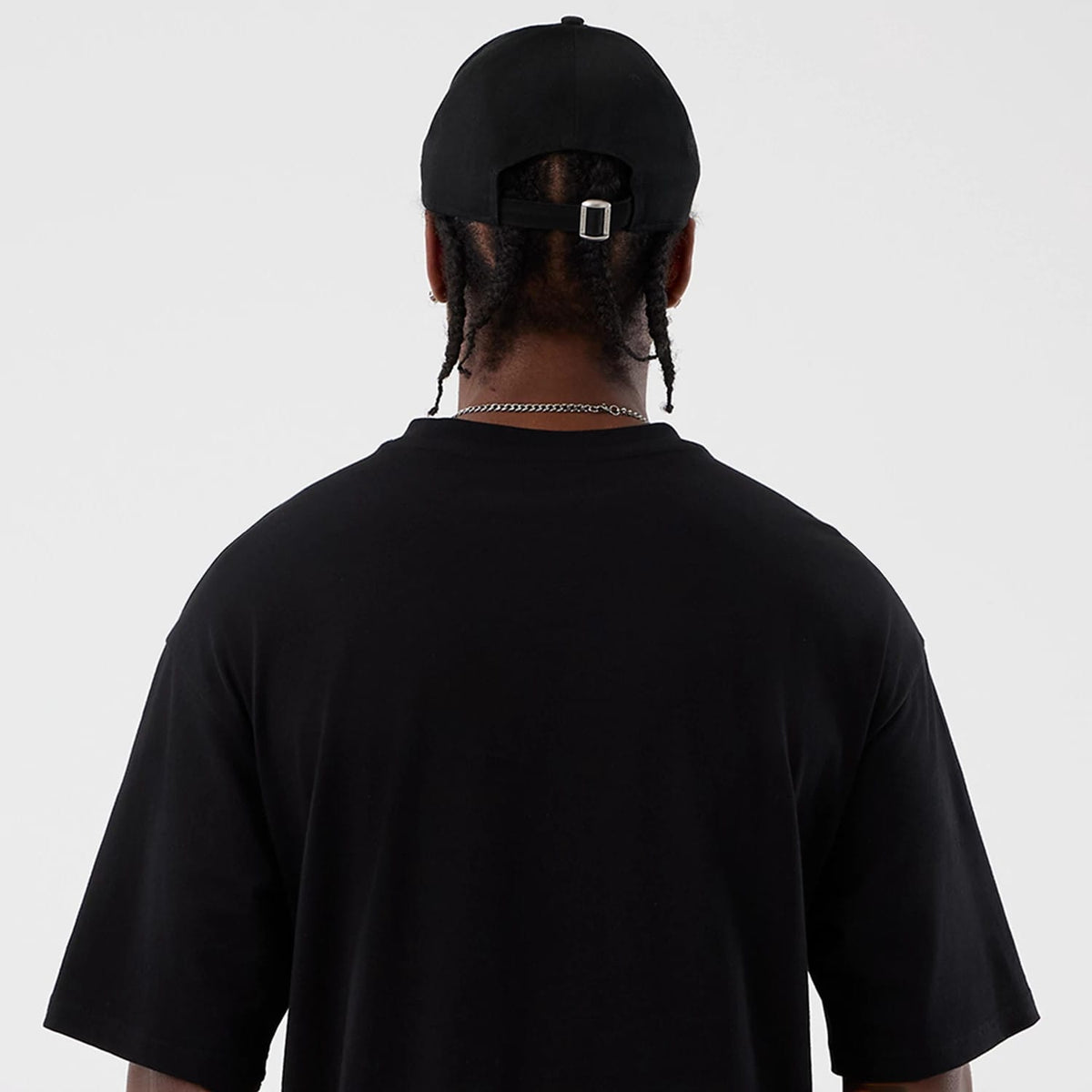 The Male model is wearing Berlin NFL International Series Games Black Oversized T-Shirt 7