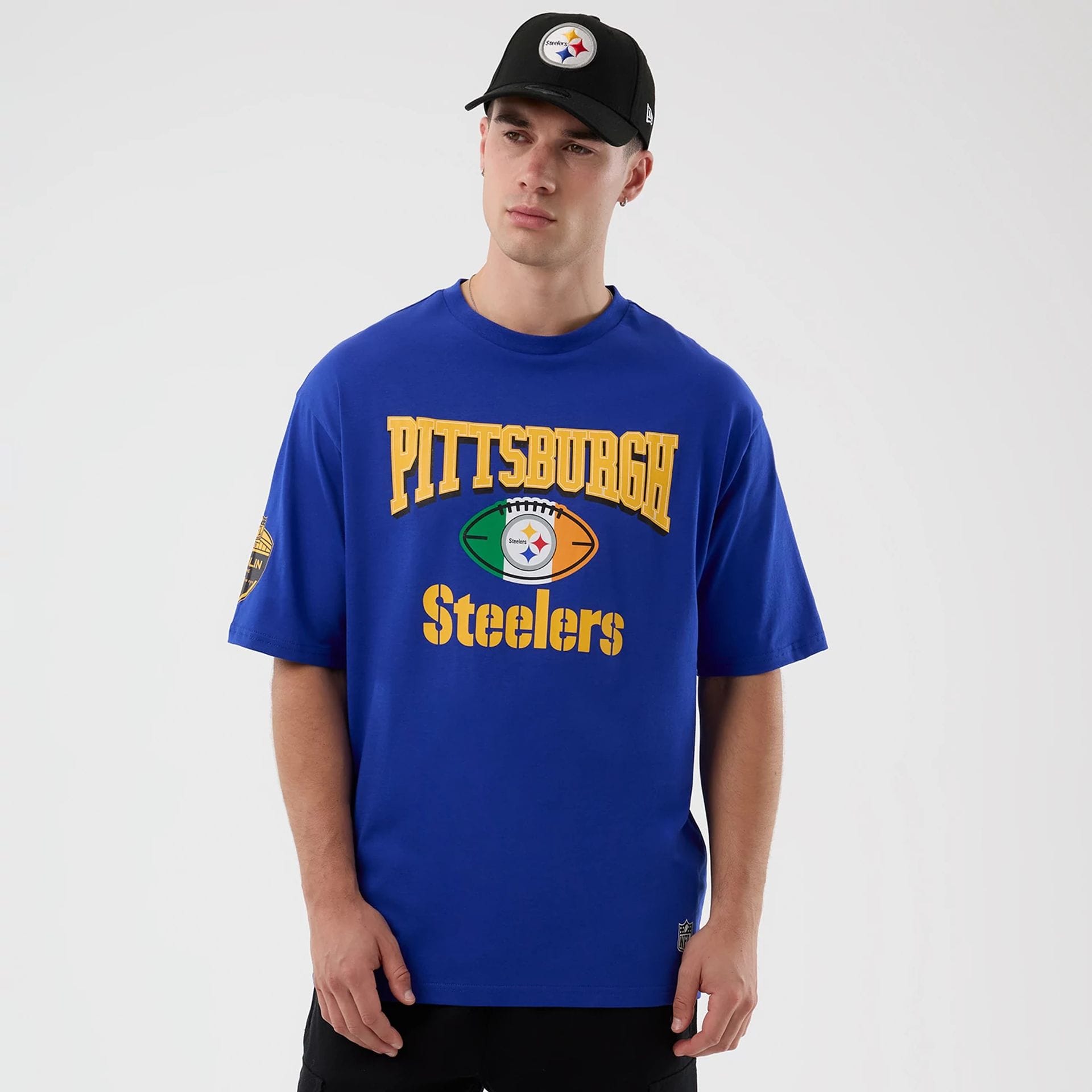 The Male model is wearing Pittsburgh Steelers NFL International Series Games Blue Oversized T-Shirt 1