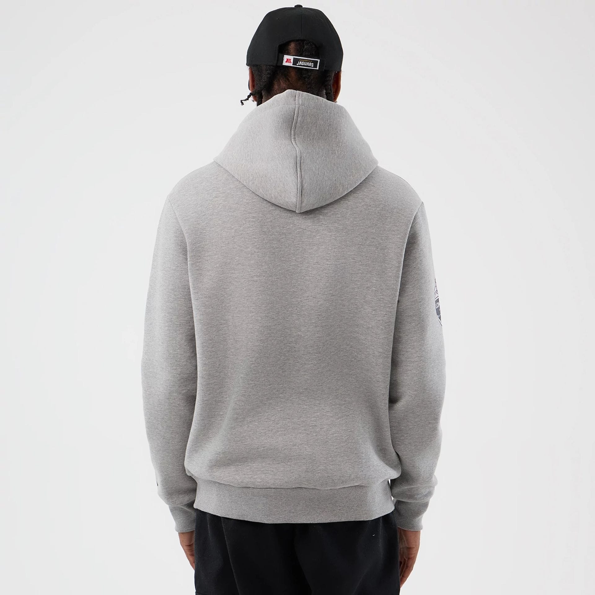 The Male model is wearing Jacksonville Jaguars NFL International Series Games Grey Pullover Hoodie 2