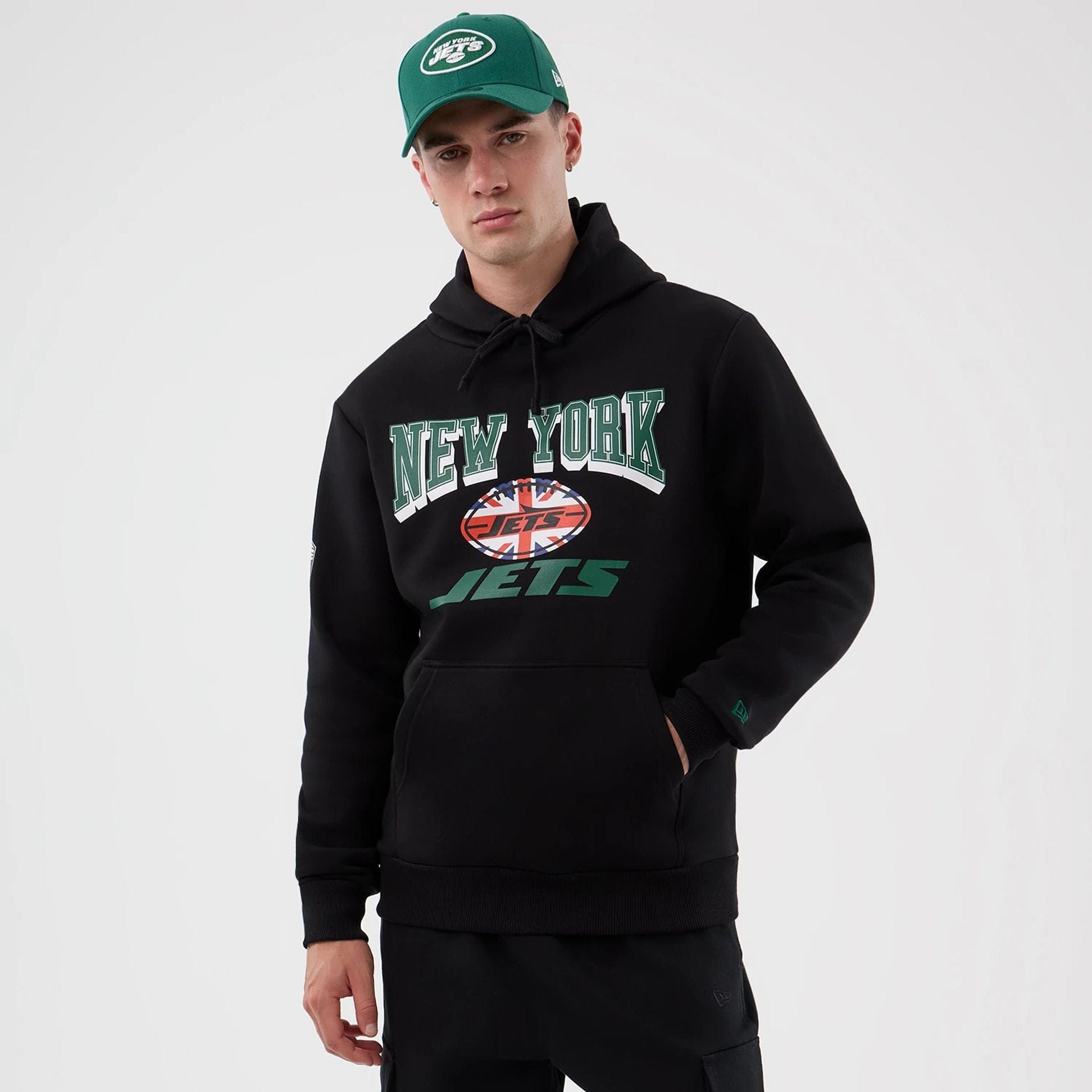 The Male model is wearing New York Jets NFL International Series Games Black Pullover Hoodie 1