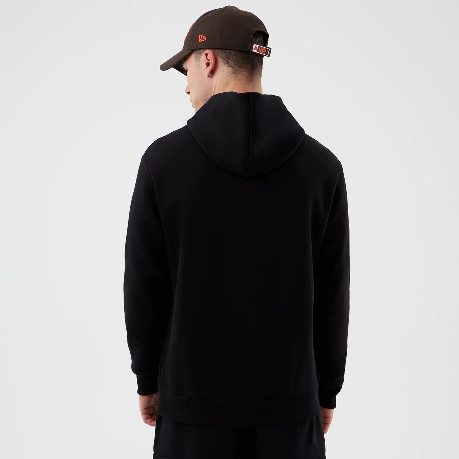 The Male model is wearing Cleveland Browns NFL International Series Games Black Pullover Hoodie 2