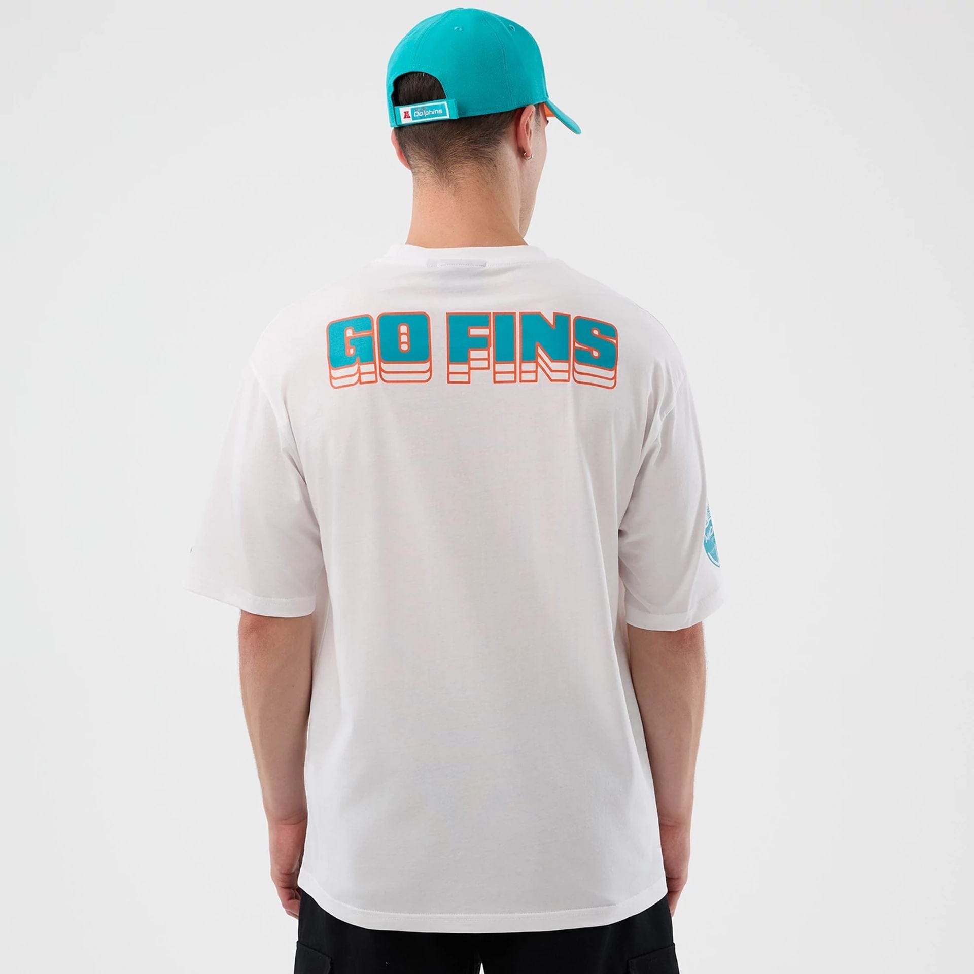 The Male model is wearing Miami Dolphins NFL International Series Games White Oversized T-Shirt 2