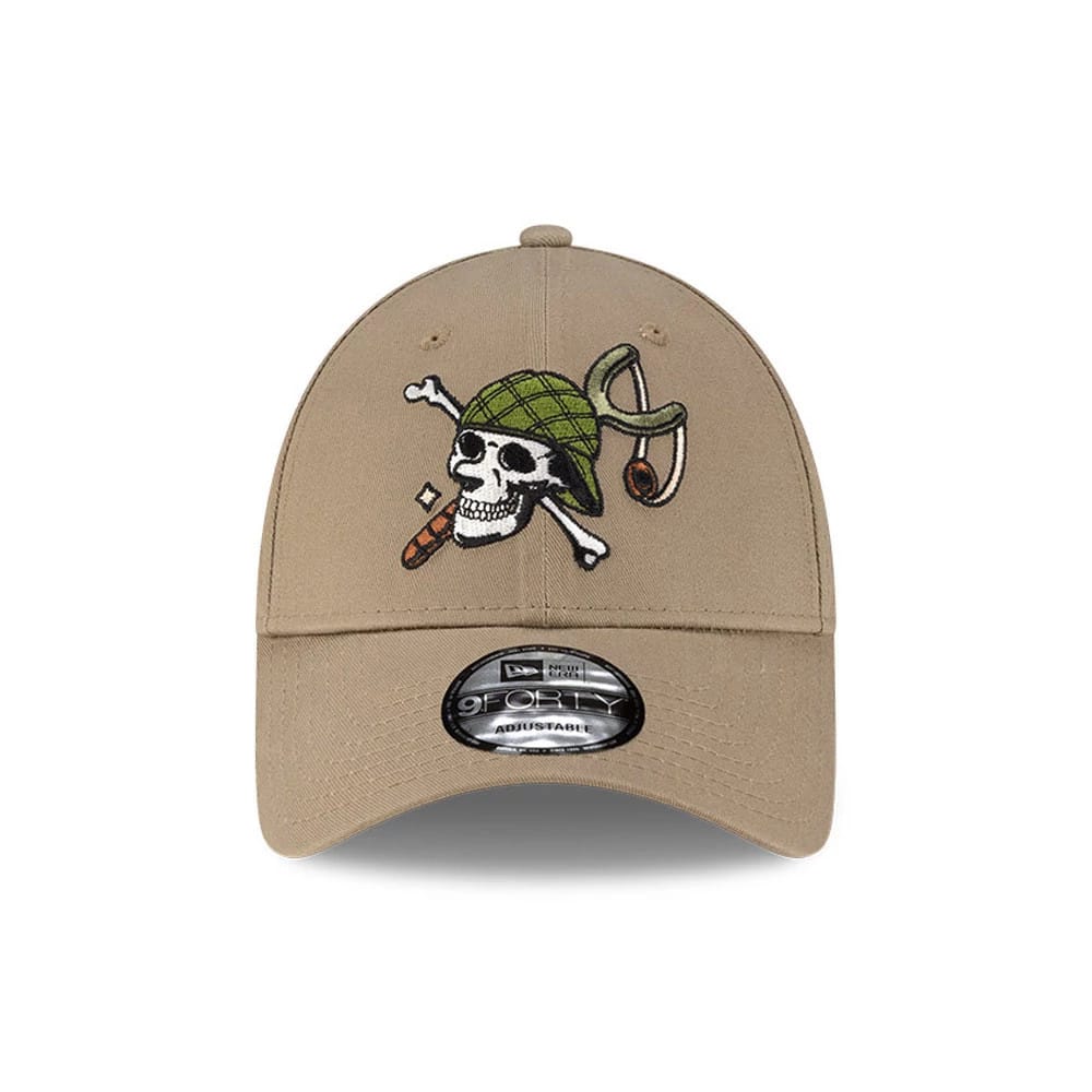 One Piece Usopp Beige New Era 9FORTY Adjustable Cap, front view showing the embroidered green hat logo with a skull and crossbones on the centre of the beige crown, complemented by a black 9FORTY size sticker on the curved visor.