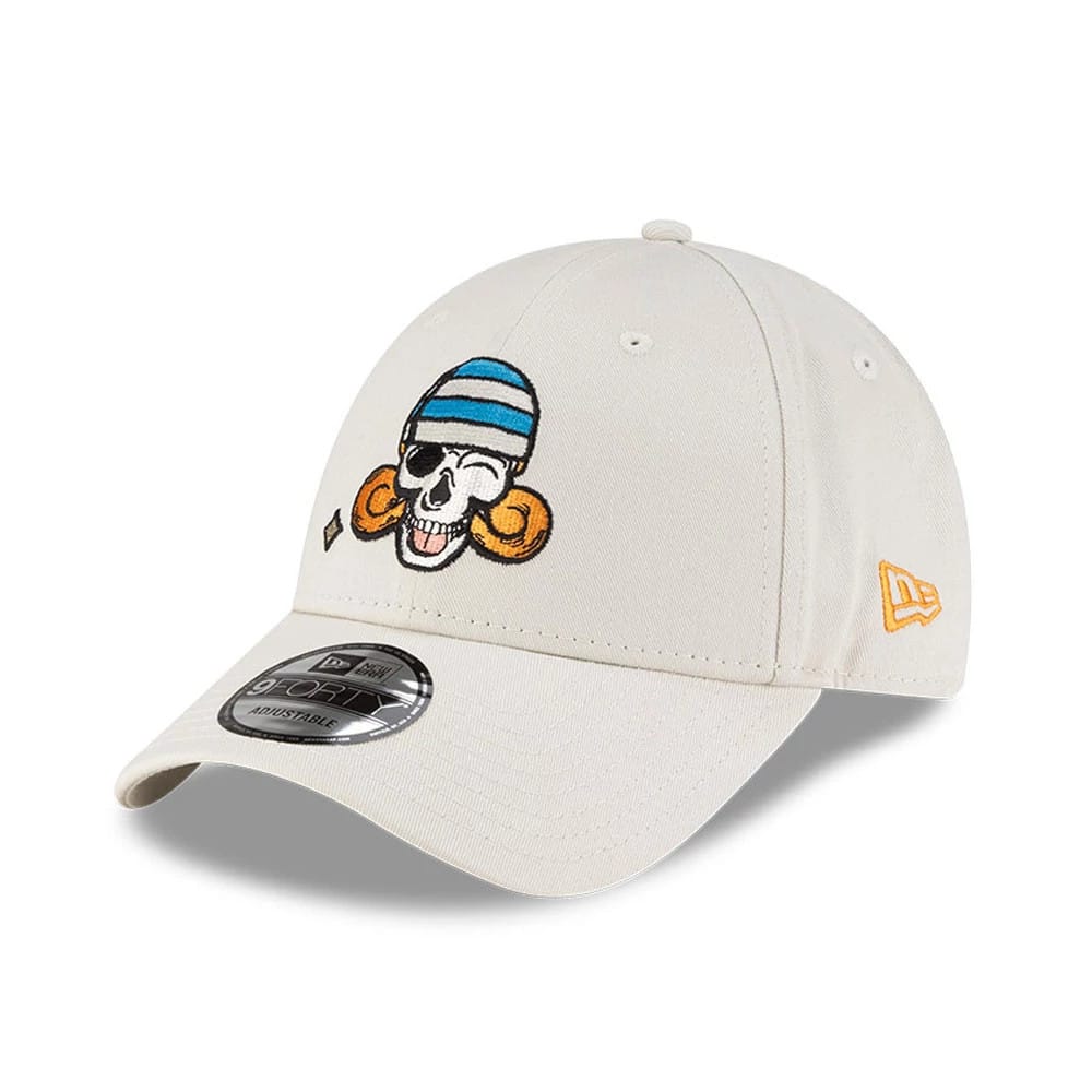 One Piece Nami Light Beige New Era 9FORTY Adjustable Cap, three-quarter view showing the colourful embroidered skull and orange swirl logo on the front panel, with a curved visor, 9FORTY size sticker, and yellow New Era flag logo on the left side.