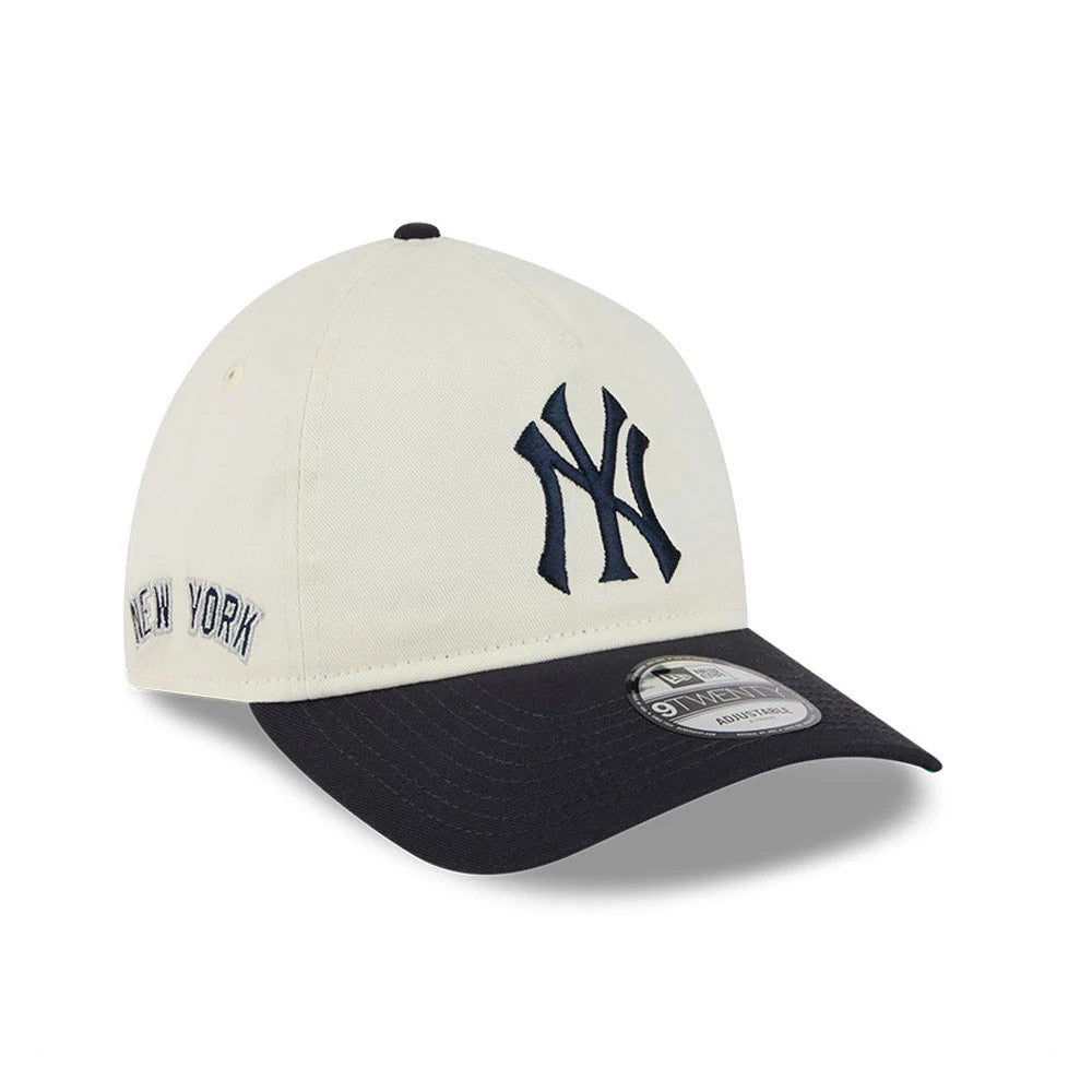 New York Yankees MLB Chrome White New Era 9TWENTY A-Frame Adjustable Cap, three-quarter view showing the raised navy NY logo on the front panel, black curved visor with a 9TWENTY size sticker, and embroidered New York text on the side.