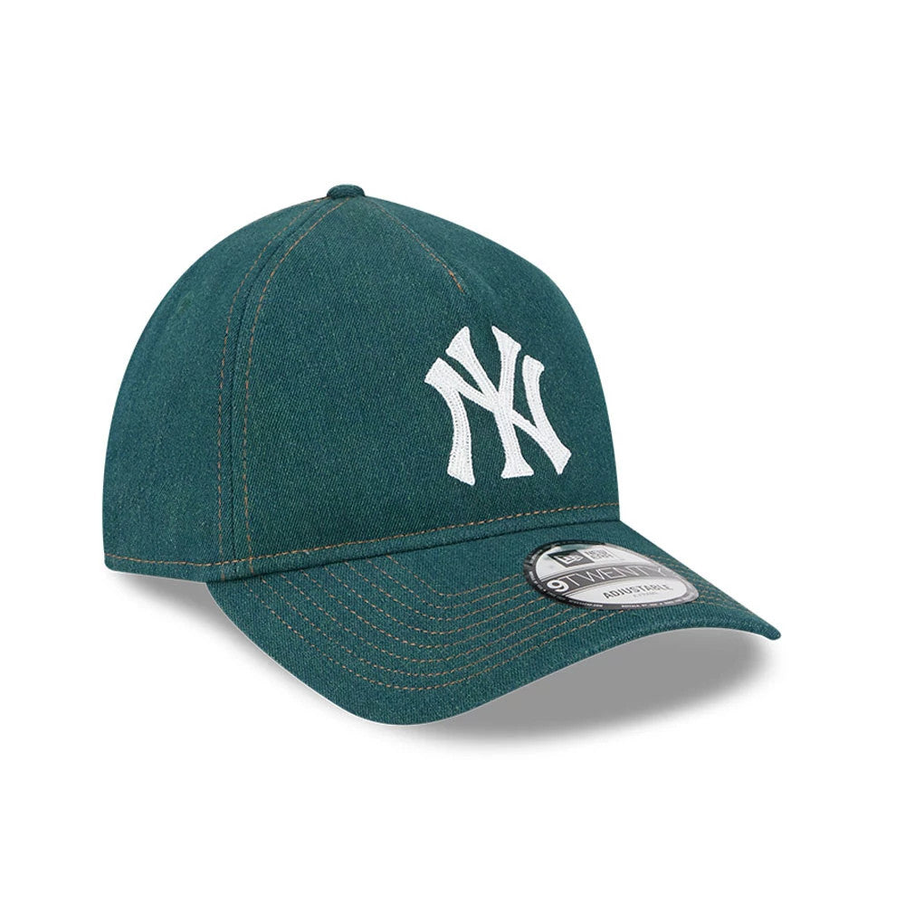 New York Yankees MLB Forest Denim Green New Era 9TWENTY A-Frame Adjustable Cap, three-quarter view with a white embroidered NY logo on the front panel, curved visor with contrast stitching, and 9TWENTY size sticker on the top.