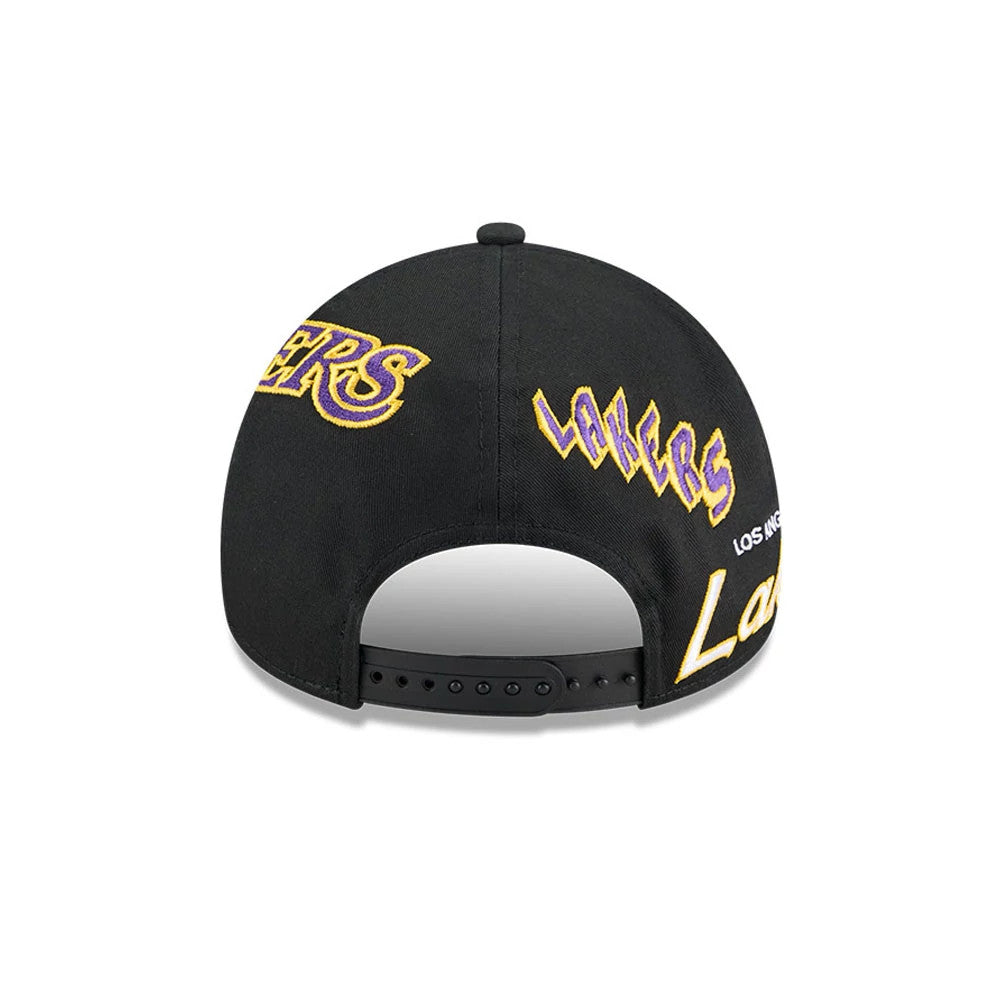 LA Lakers NBA All Over Black New Era 9FORTY A-Frame Adjustable Cap, rear view showing purple and gold embroidered Lakers lettering on the structured black crown, centred over the adjustable back strap.