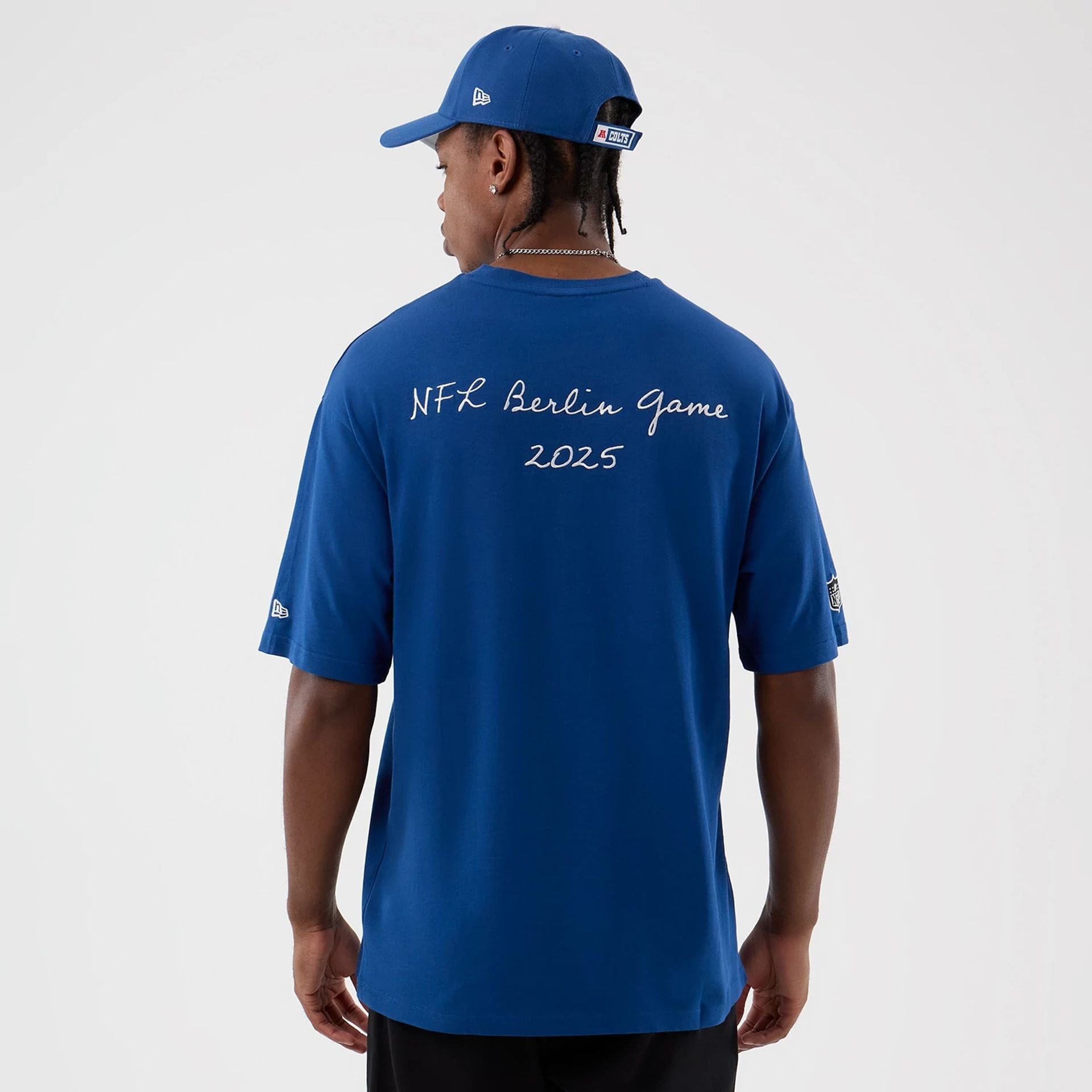 The Male model is wearing Indianapolis Colts NFL International Series Games Blue Oversized T-Shirt 2