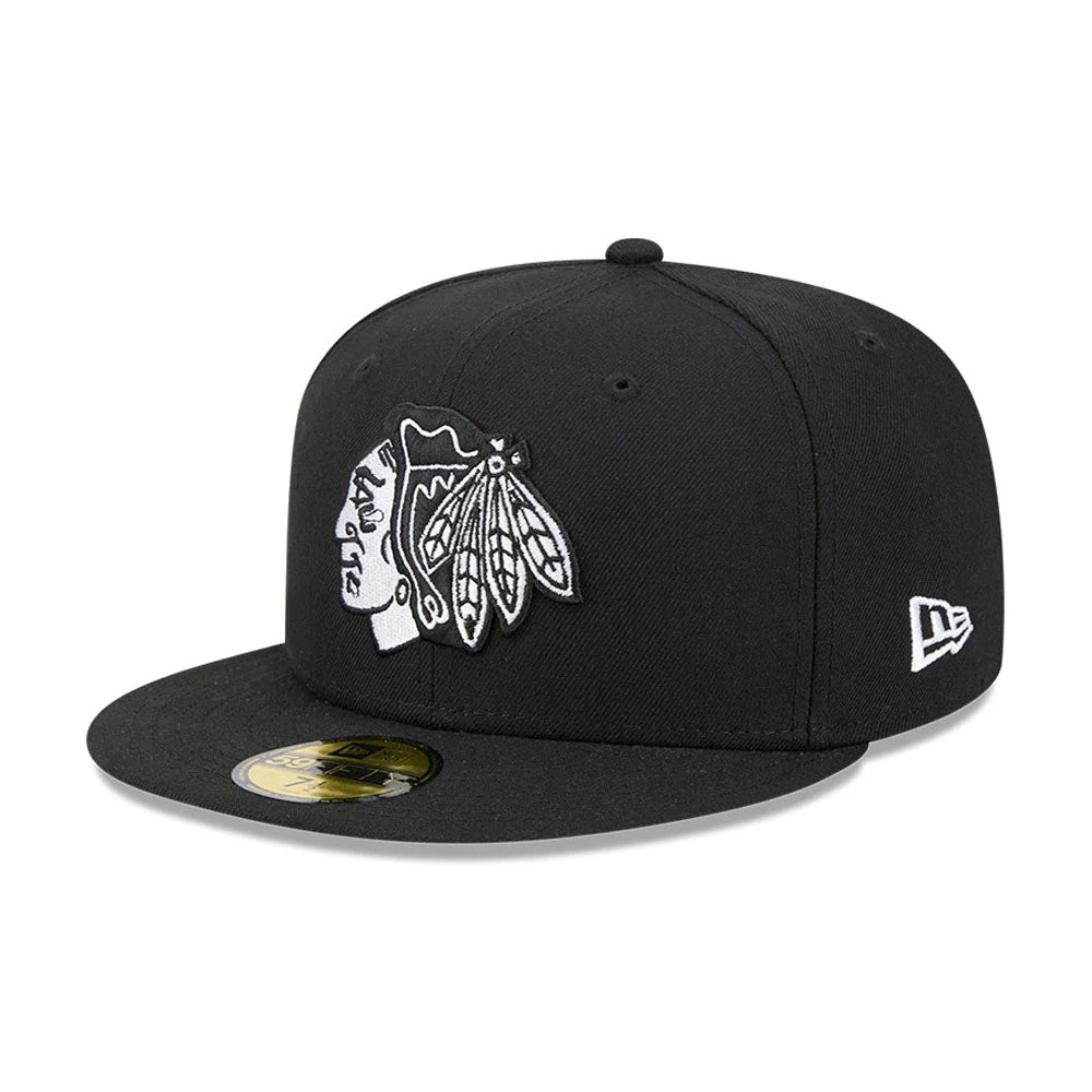 Chicago Blackhawks NHL Evergreen Black New Era 59FIFTY Fitted Cap, front and side view showing the black and white embroidered Blackhawks logo on the front panel, a black visor with a gold 59FIFTY size sticker.
