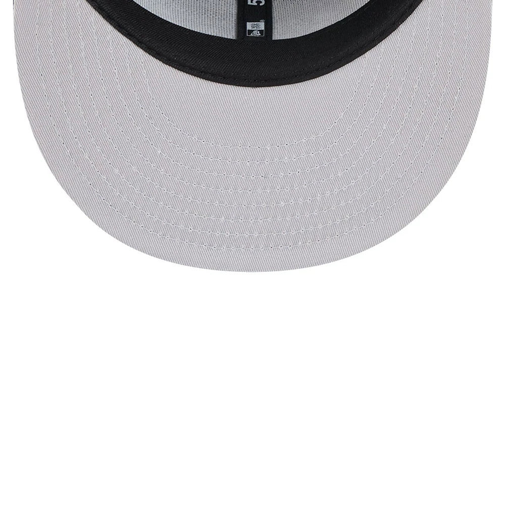 Chicago Blackhawks NHL Evergreen Black New Era 59FIFTY Fitted Cap, inside view showing the grey undervisor, black internal taping with the brand logo, and a ventilated black sweatband encircling the interior.
