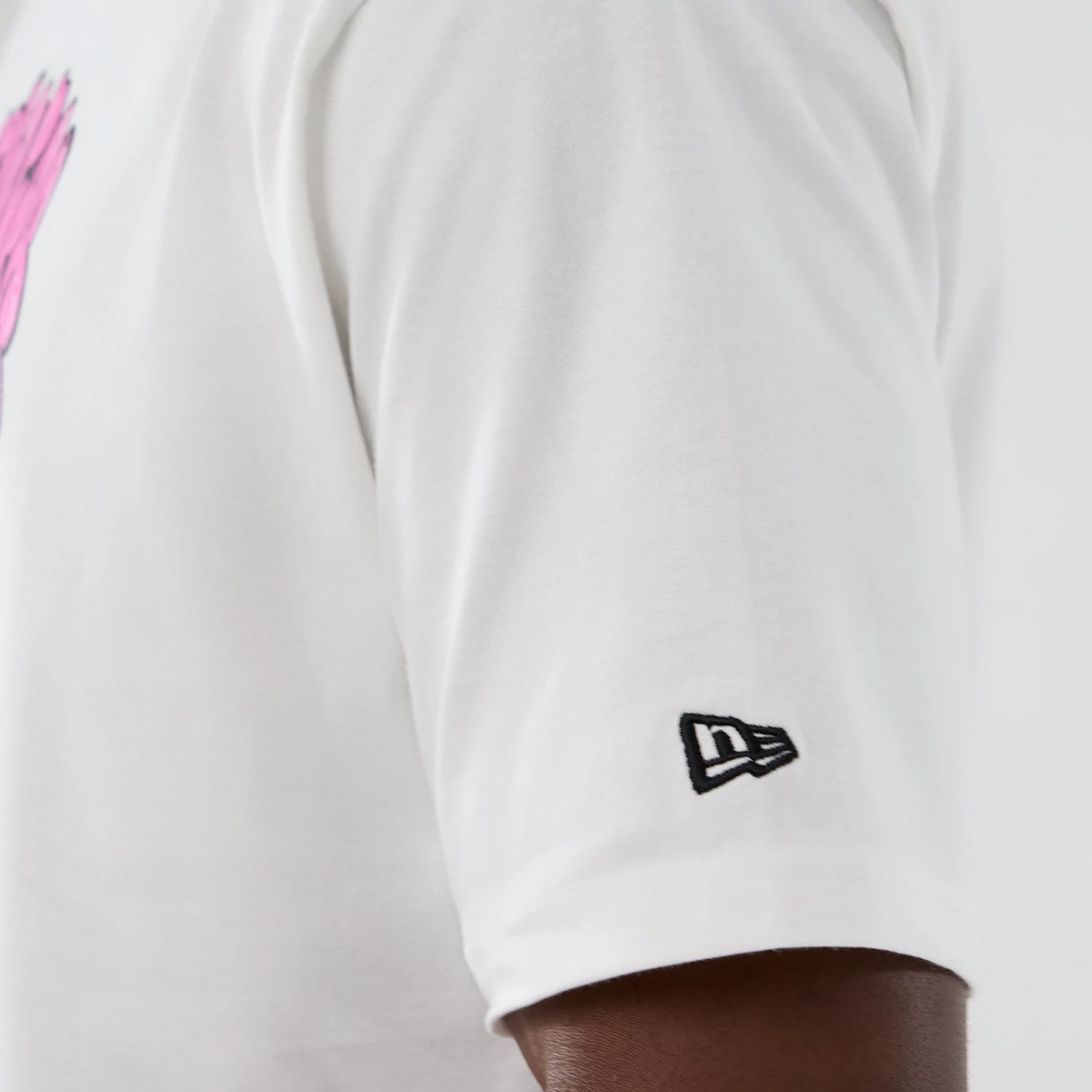 The Male model is wearing New Era Halloween Skull Graphic White Oversized T-Shirt 4