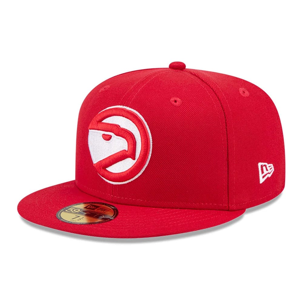 Atlanta Hawks NBA Hardwood Classic Red New Era 59FIFTY Fitted Cap, three-quarter view showing the raised red and white Hawks logo embroidered on the front panel, red flat visor with a gold 59FIFTY size sticker, and New Era flag logo on the left side.