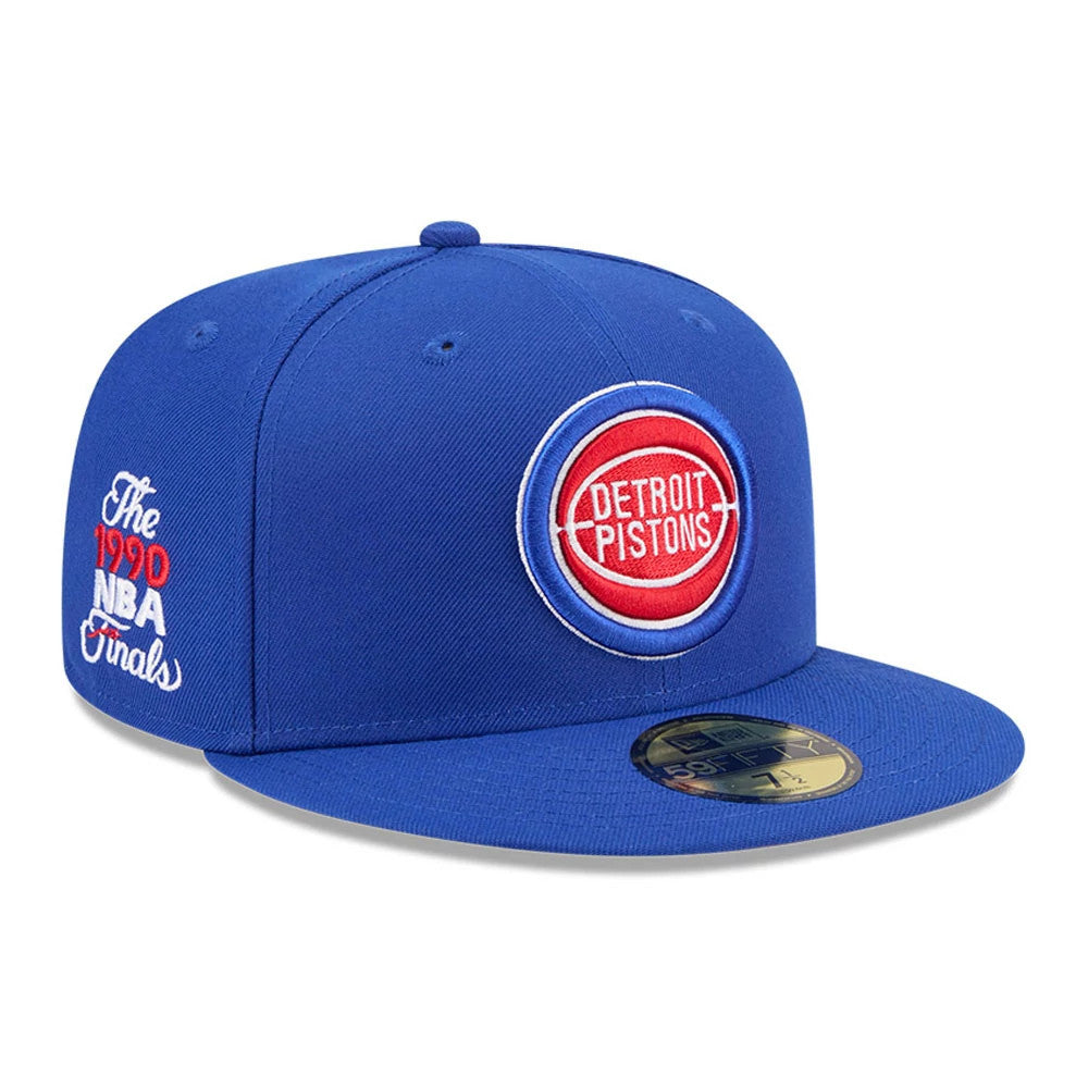 Detroit Pistons NBA Hardwood Classic Blue New Era 59FIFTY Fitted Cap, front view showing a red and white Detroit Pistons logo embroidered on the blue front panel, with a flat blue visor and a gold 59FIFTY size sticker.