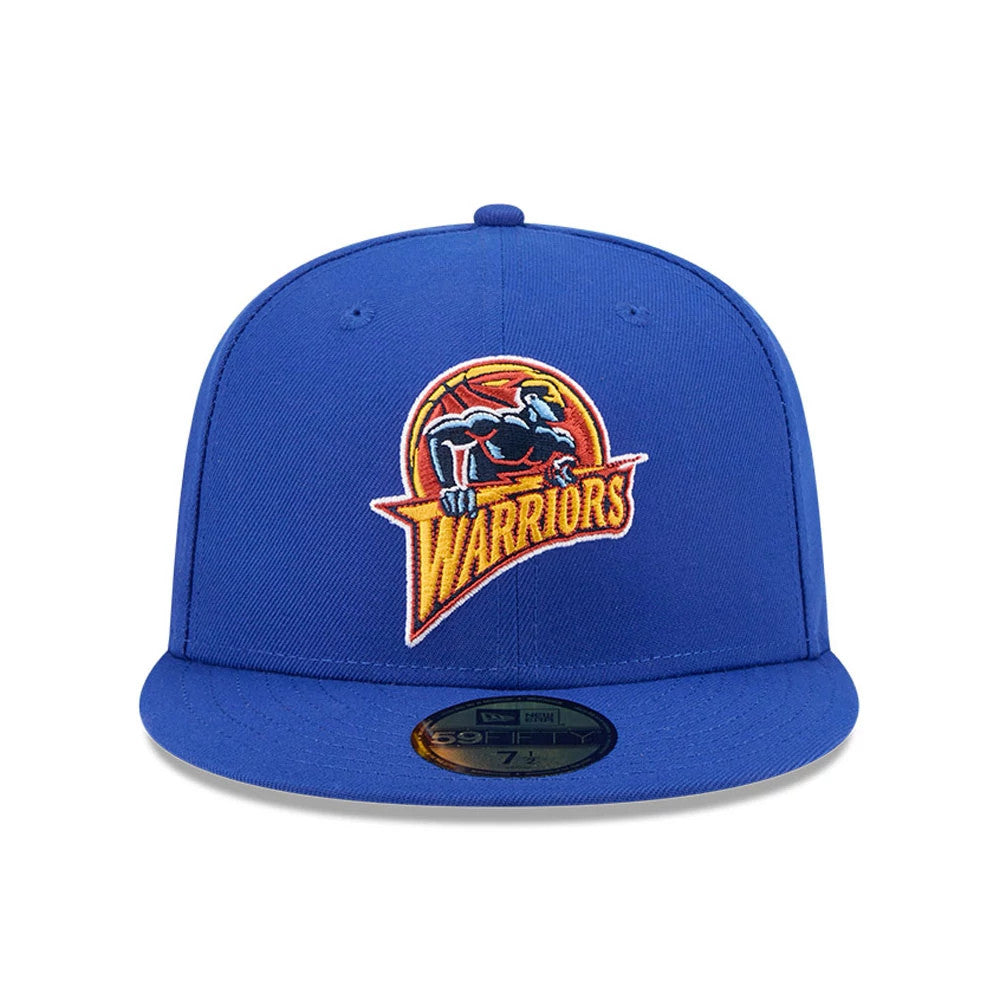 Warriors NBA Hardwood Classic Sidepatch Blue New Era 59FIFTY Fitted Cap, front view showing the raised embroidered Warriors logo in orange and yellow on the structured blue crown with a flat blue visor and gold 59FIFTY size sticker.
