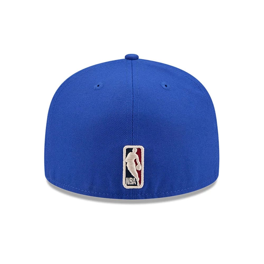 Minnesota Timberwolves NBA Hardwood Classic Blue New Era 59FIFTY Fitted Cap, rear view showing the embroidered NBA logo at the centre of the back panels, accentuated by the structured blue crown and matching top button.