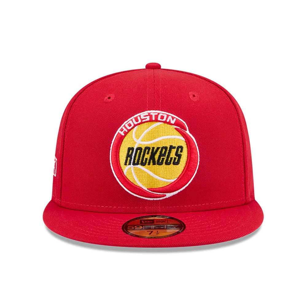 Houston Rockets NBA Hardwood Classic Anniversary Red New Era 59FIFTY Fitted Cap, front view showing the raised embroidered Rockets logo with a basketball motif on the red front panel, paired with a matching red visor and a gold 59FIFTY size sticker.