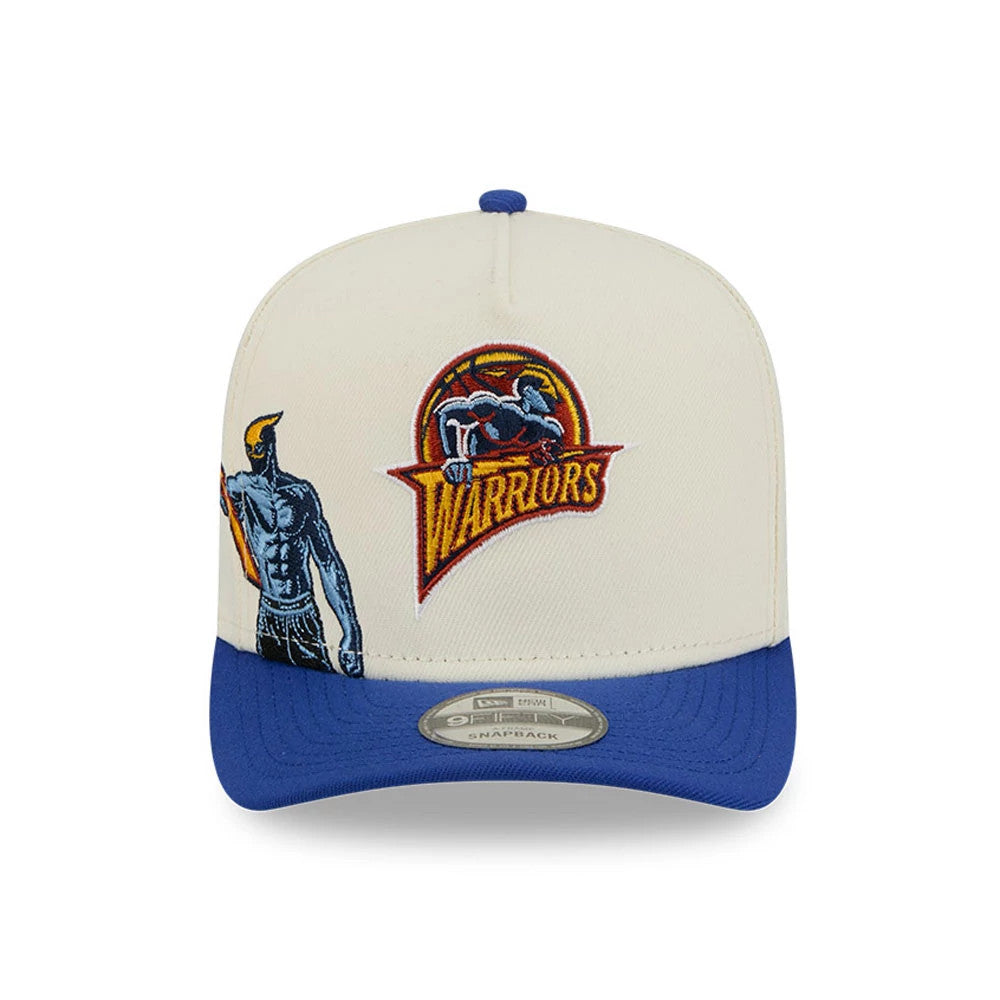 Golden State Warriors NBA Blue New Era 9FIFTY A-Frame Snapback Adjustable Cap, front view showing the embroidered Warriors logo in orange and blue on the cream front panel with a blue visor and the 9FIFTY size sticker.