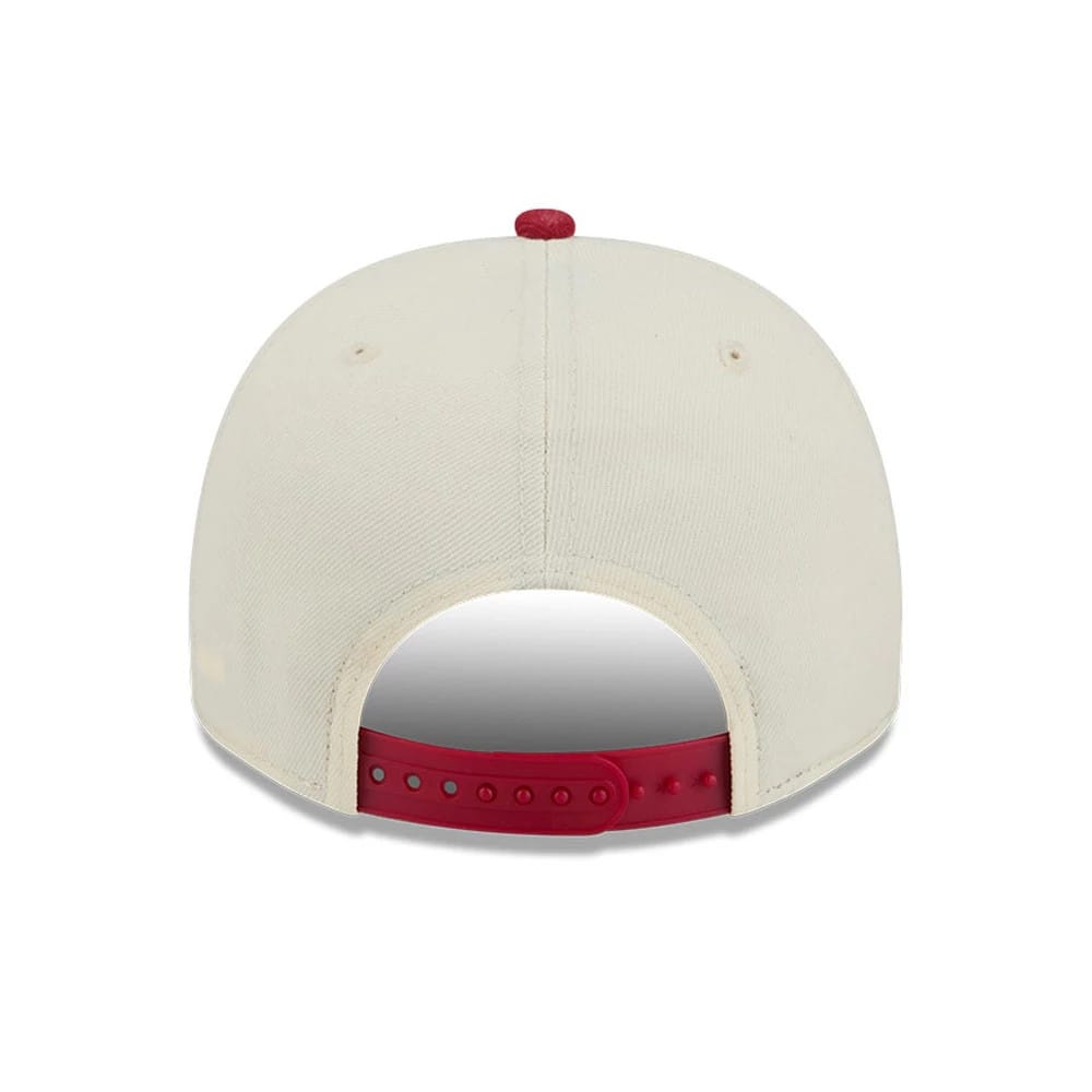 Denver Nuggets NBA Dark Red New Era 9FIFTY A-Frame Snapback Adjustable Cap, rear view showcasing a dark red adjustable snapback and matching top button on the structured cream crown.