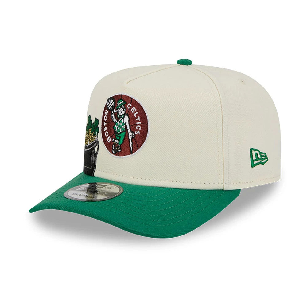 Boston Celtics NBA Cream New Era 9FIFTY A-Frame Snapback Adjustable Cap, three-quarter view with a raised embroidered Celtics logo on the front panel, green visor, and the New Era flag logo on the left side.